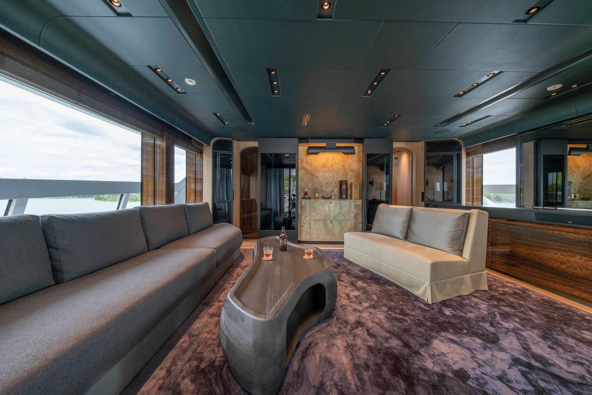Luxurious interior of 2021 Sanlorenzo 44 Alloy yacht with modern seating and elegant decor.