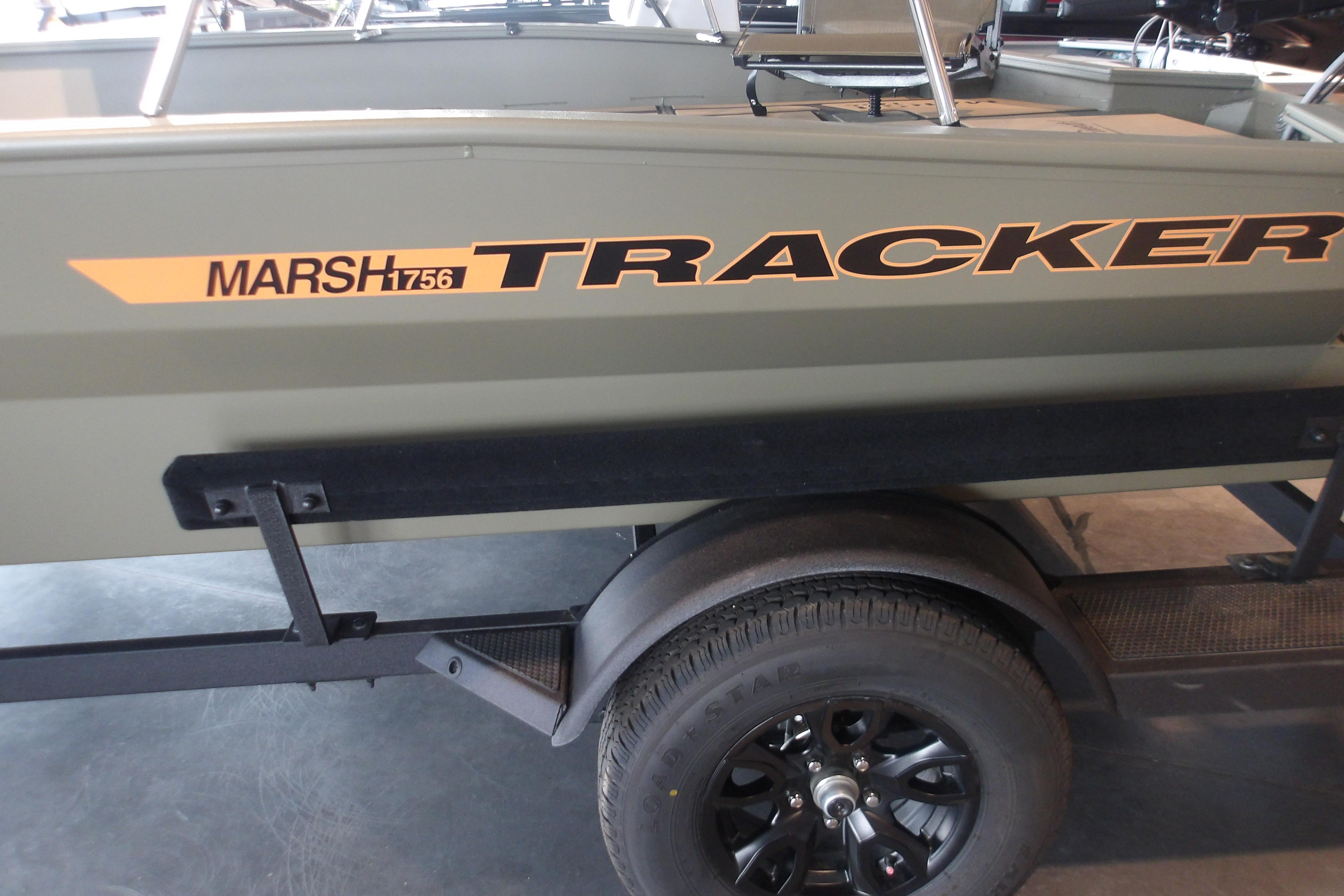 2026 Tracker Grizzly 1756 T Marsh boat on trailer, side view.