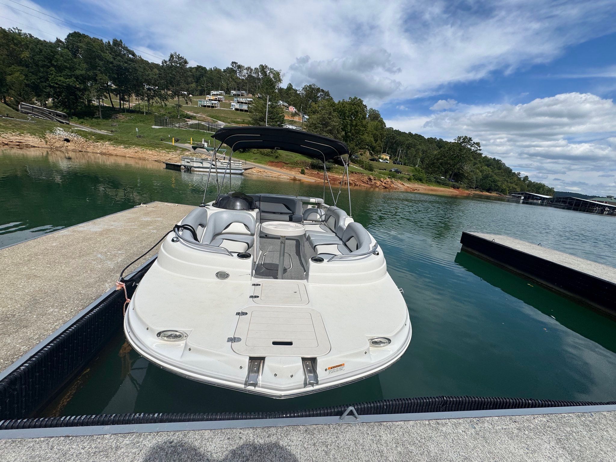 Starcraft Star Step 220 I/O boat at dock, 2015 model.