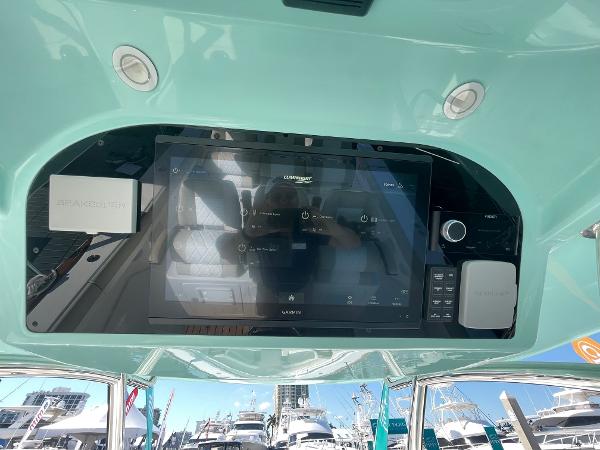 2025 Mag Bay 43 Center Console helm with advanced navigation display.