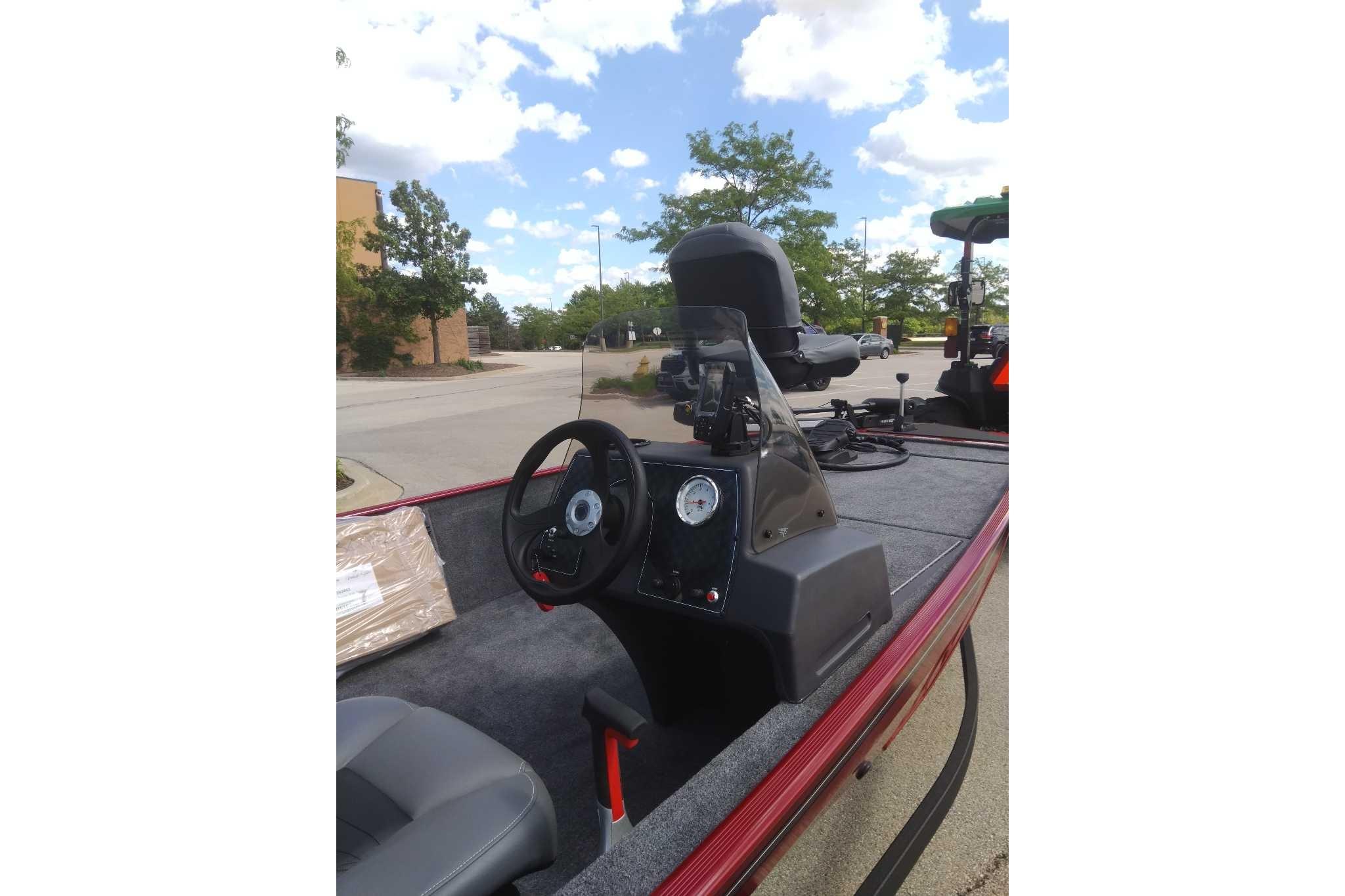 2026 Tracker Bass Tracker Classic XL boat interior with steering wheel and dashboard.