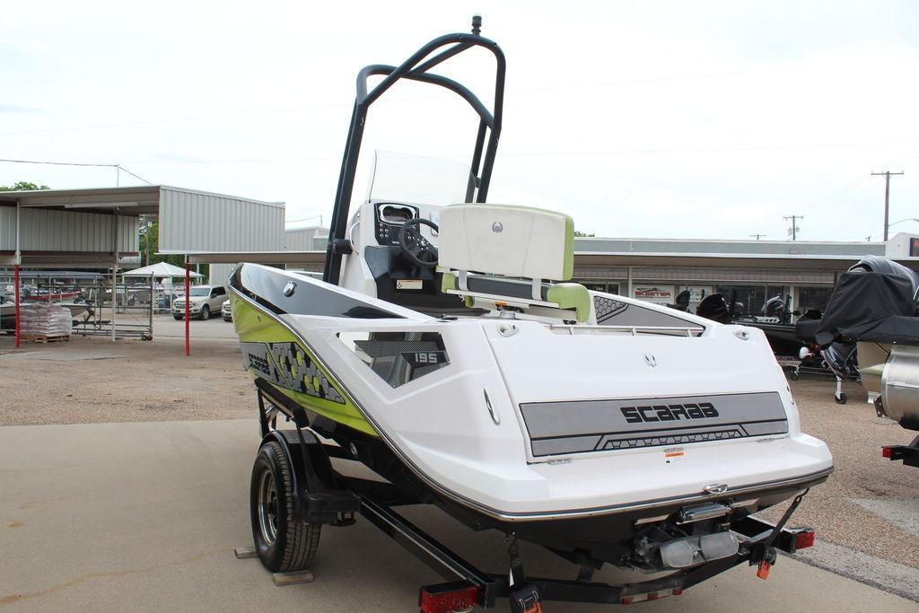 2017 Scarab 195 boat on trailer, featuring sleek design and vibrant graphics.