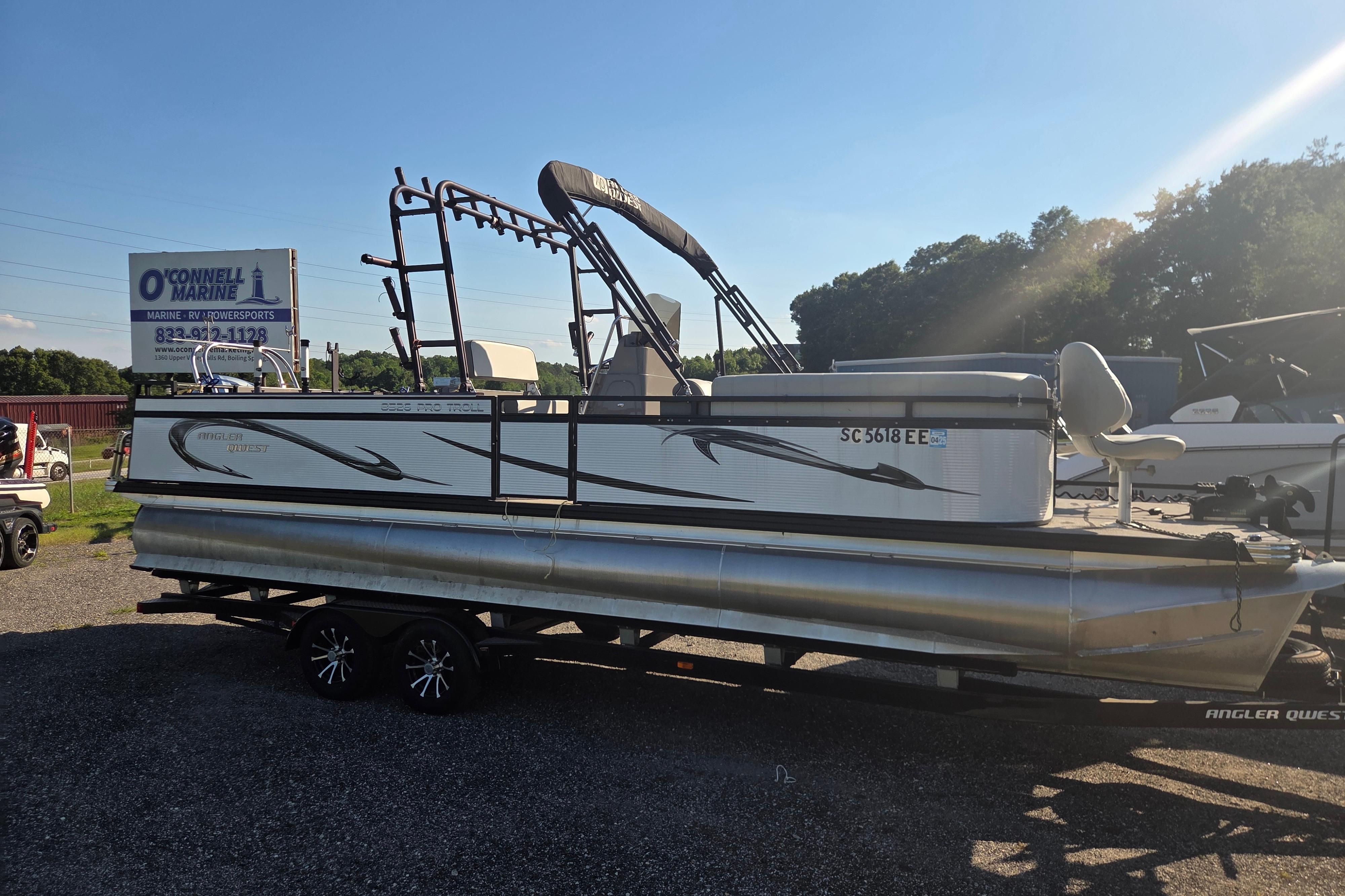 2024 Angler Qwest 8526 Pro Troll pontoon boat at O'Connell Marine dealership.