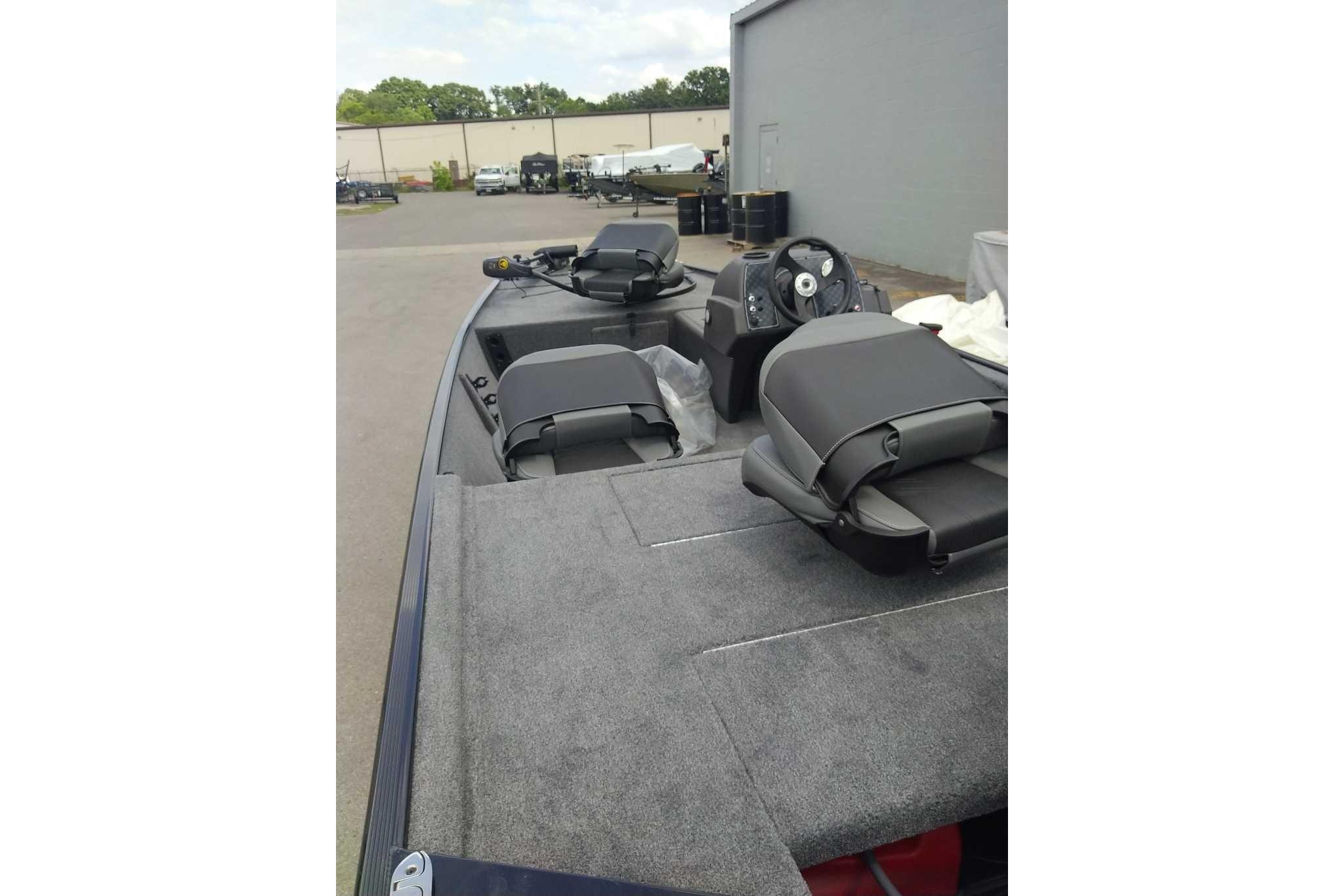 2026 Tracker Bass Tracker Classic XL boat with gray interior and steering console.