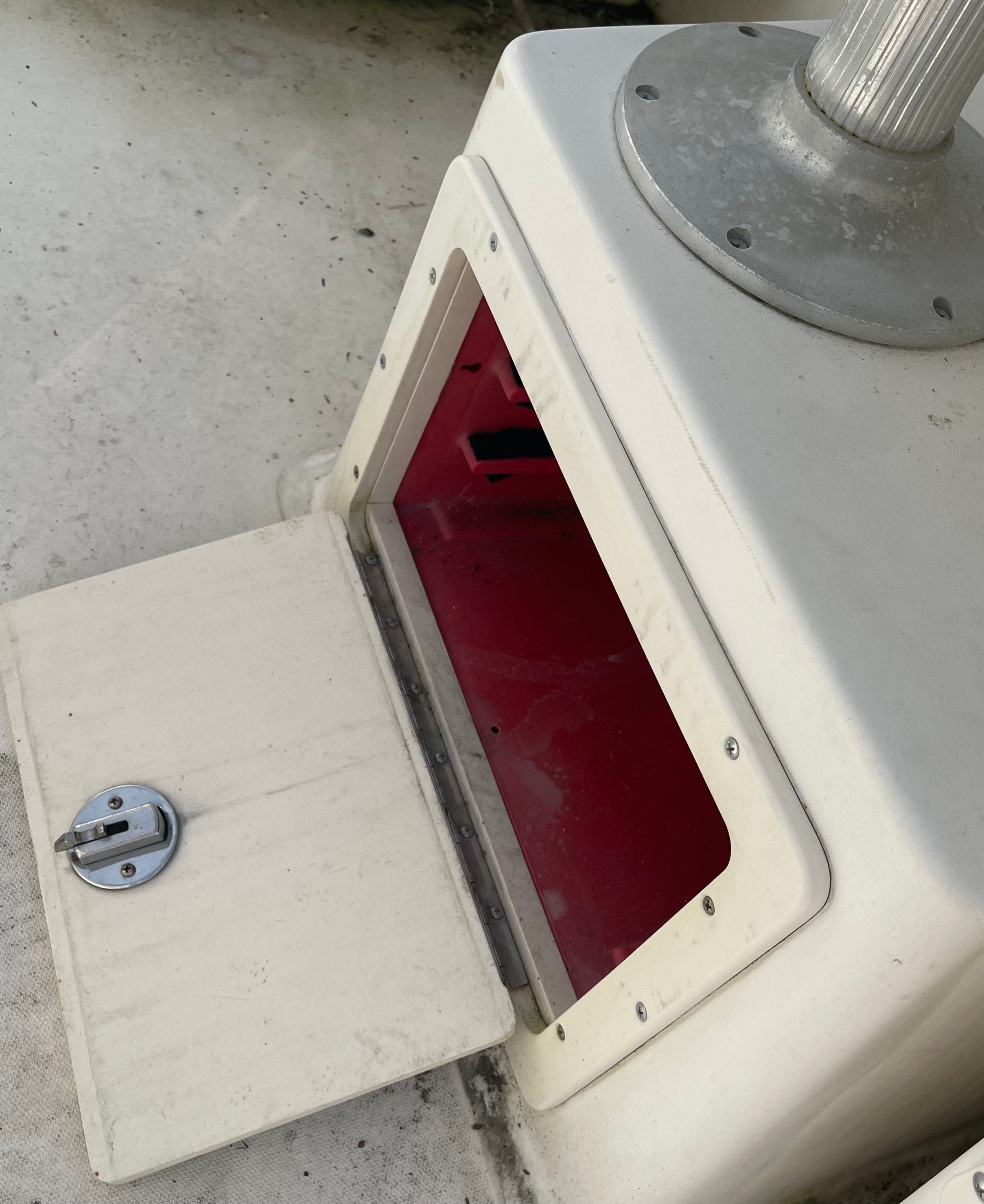 Storage compartment on a 2001 Boston Whaler 26 Conquest boat.