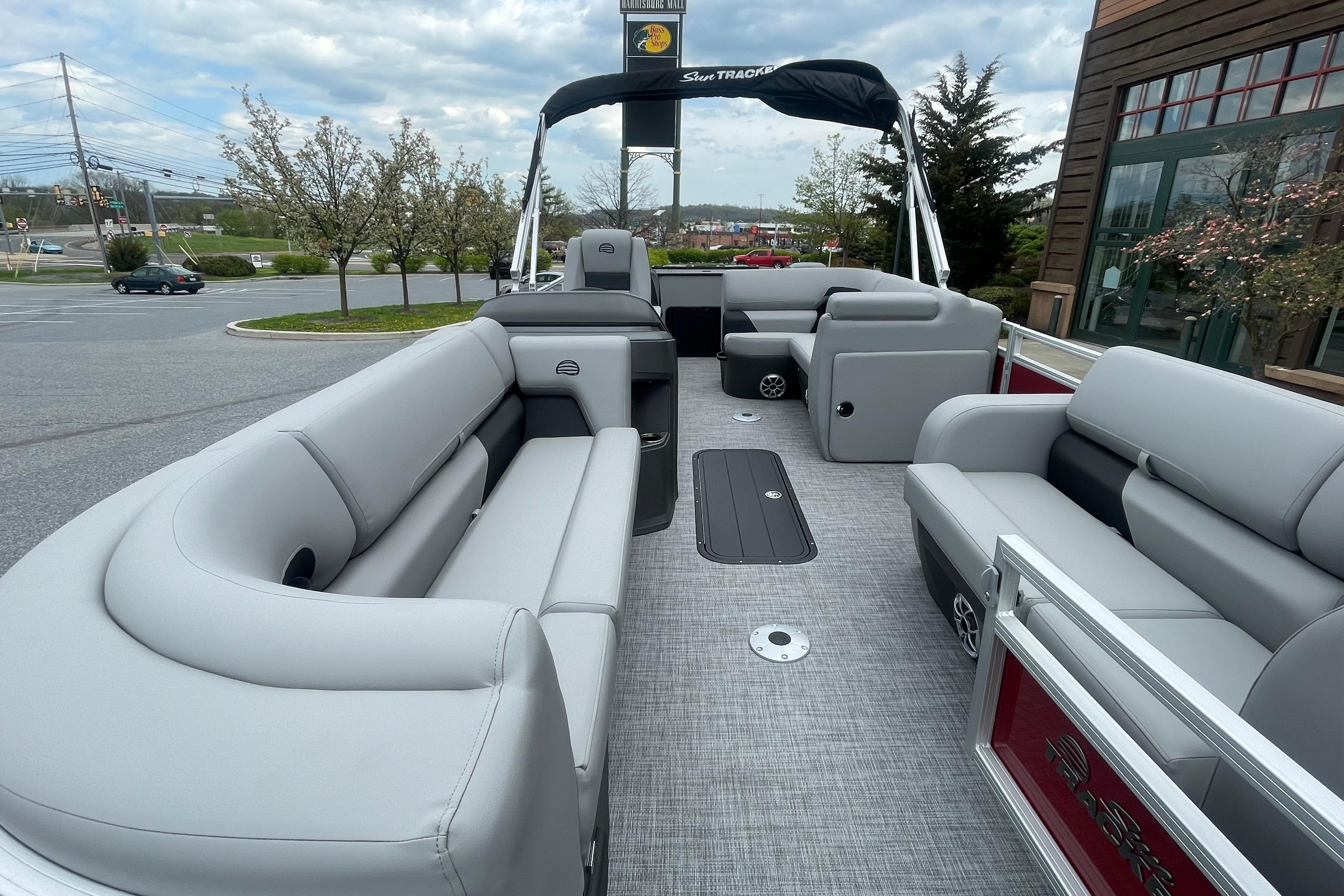 2026 Sun Tracker SportFish 22 XP3 pontoon boat with spacious seating and modern design.