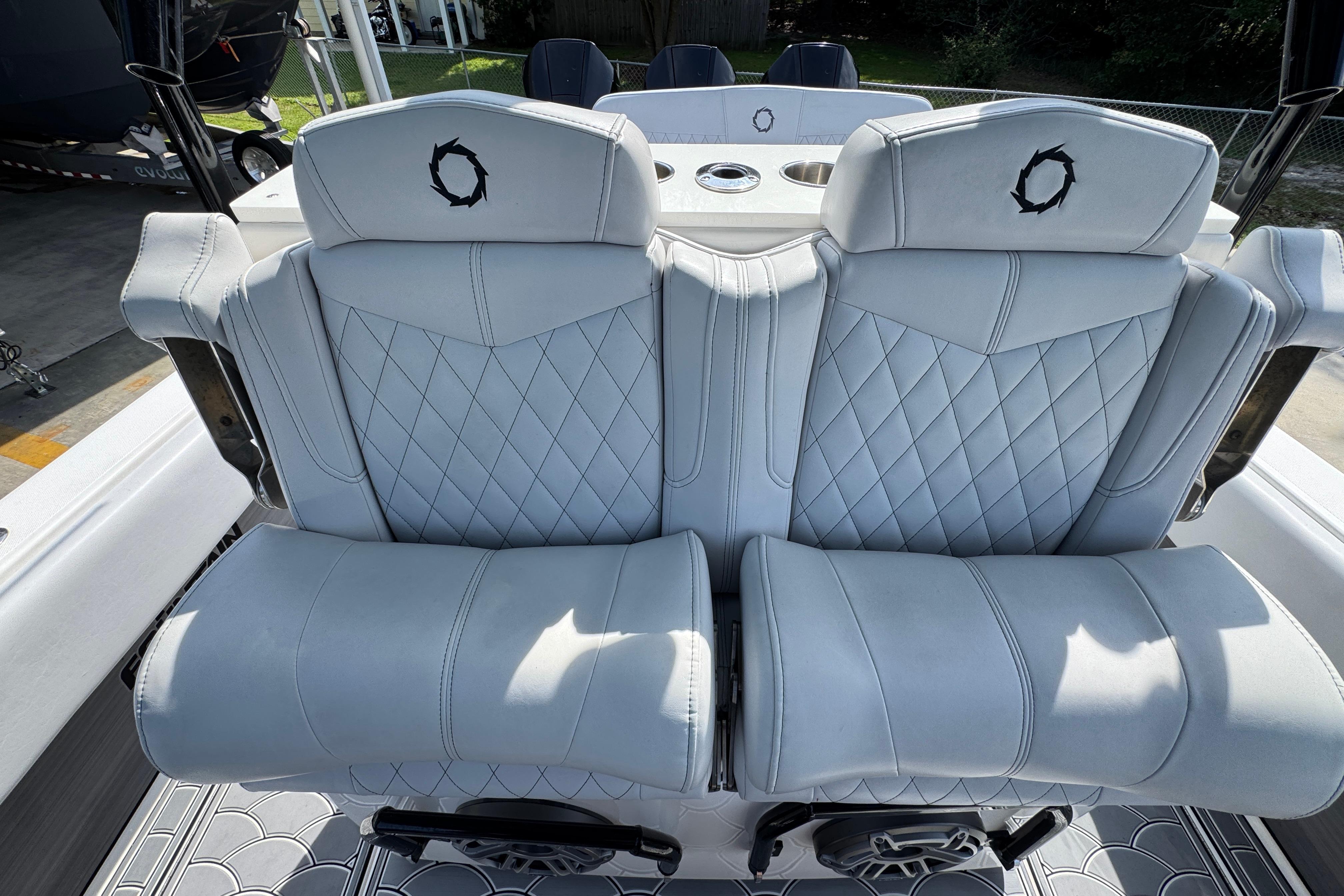 Luxury seating on 2023 Fountain 34 Tournament Edition boat, featuring diamond-stitched upholstery.