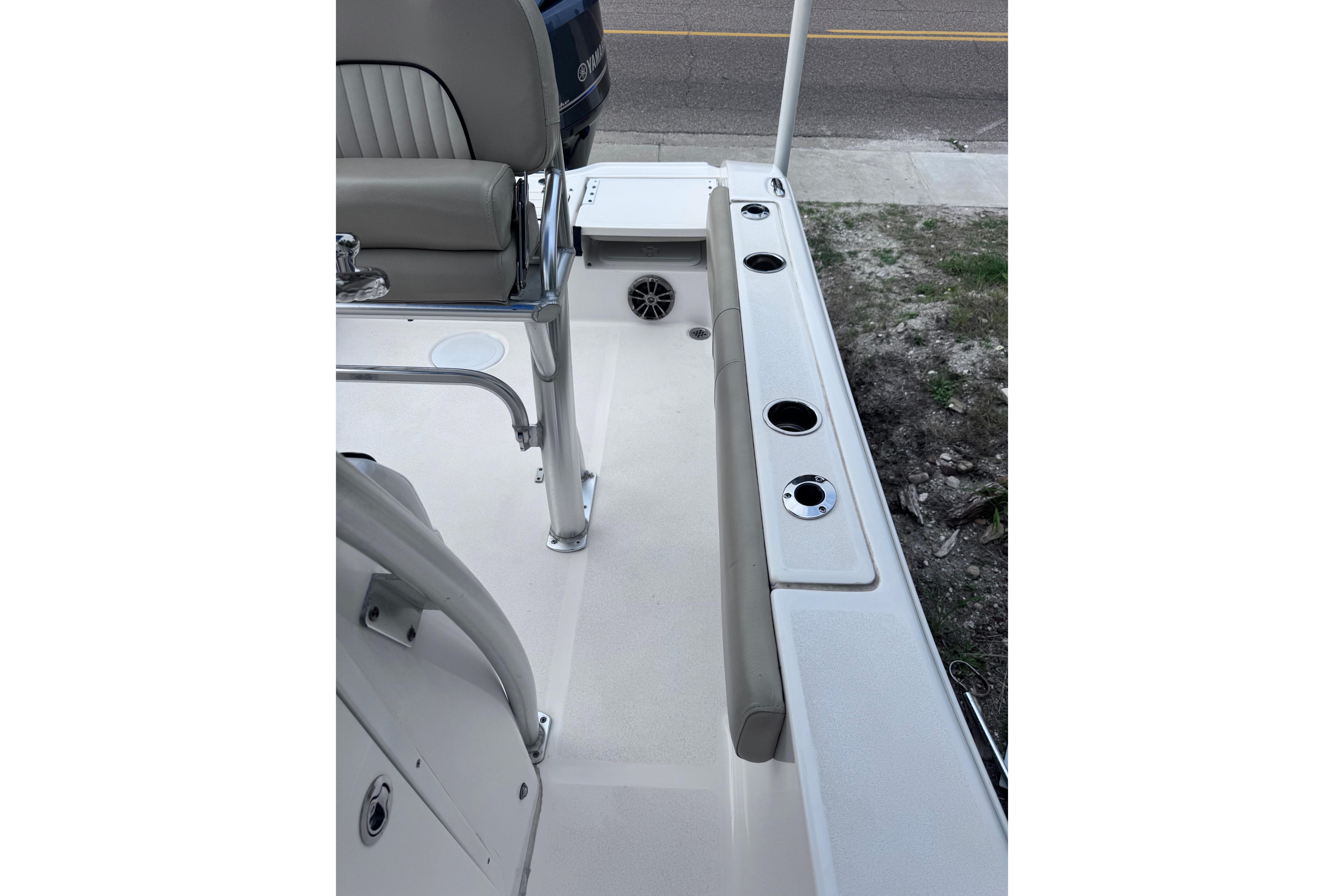 2018 Sea Fox 206 Commander boat interior with seating and rod holders.
