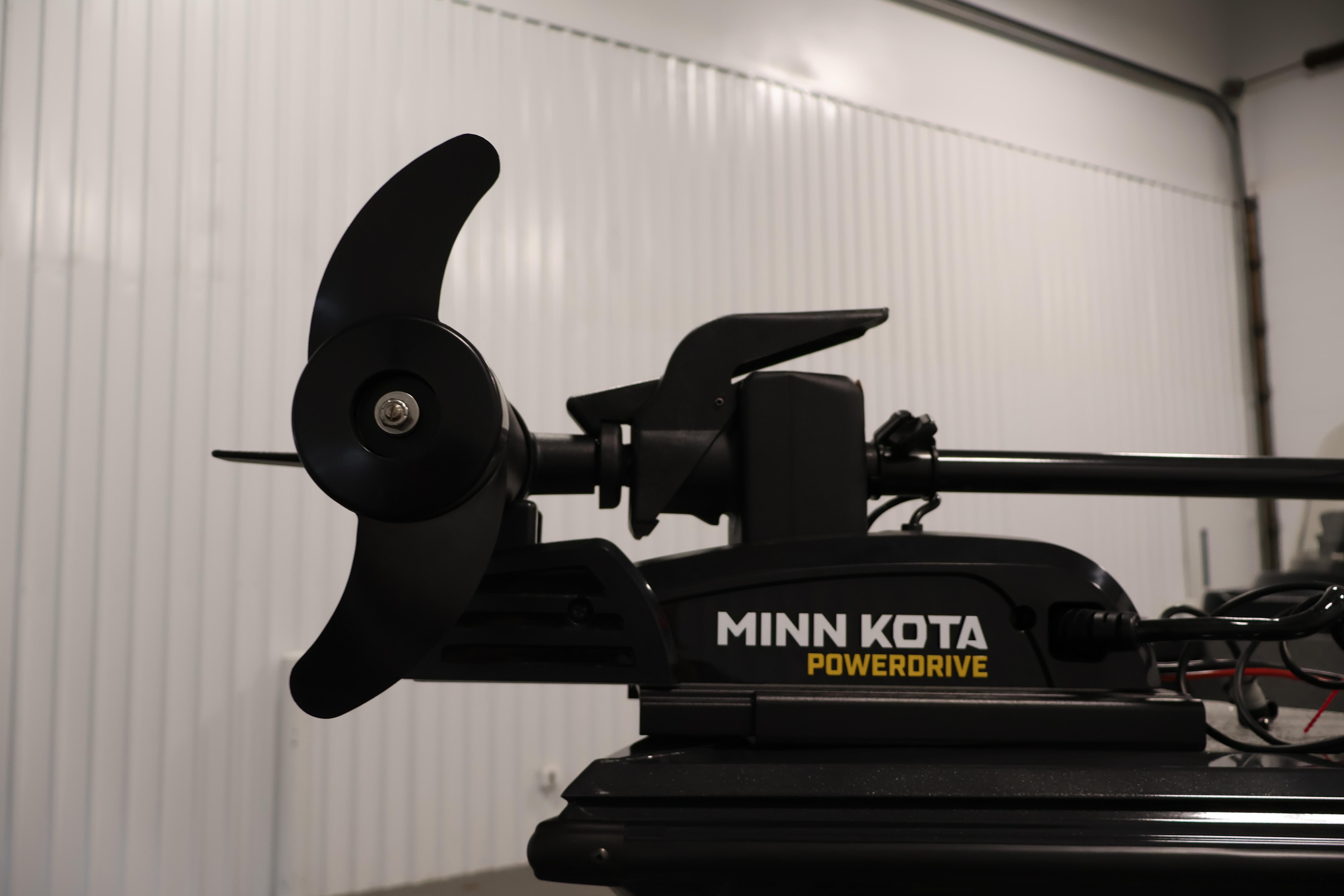 Minn Kota PowerDrive motor on 2026 Crestliner 1850 Kodiak SC boat in a garage.