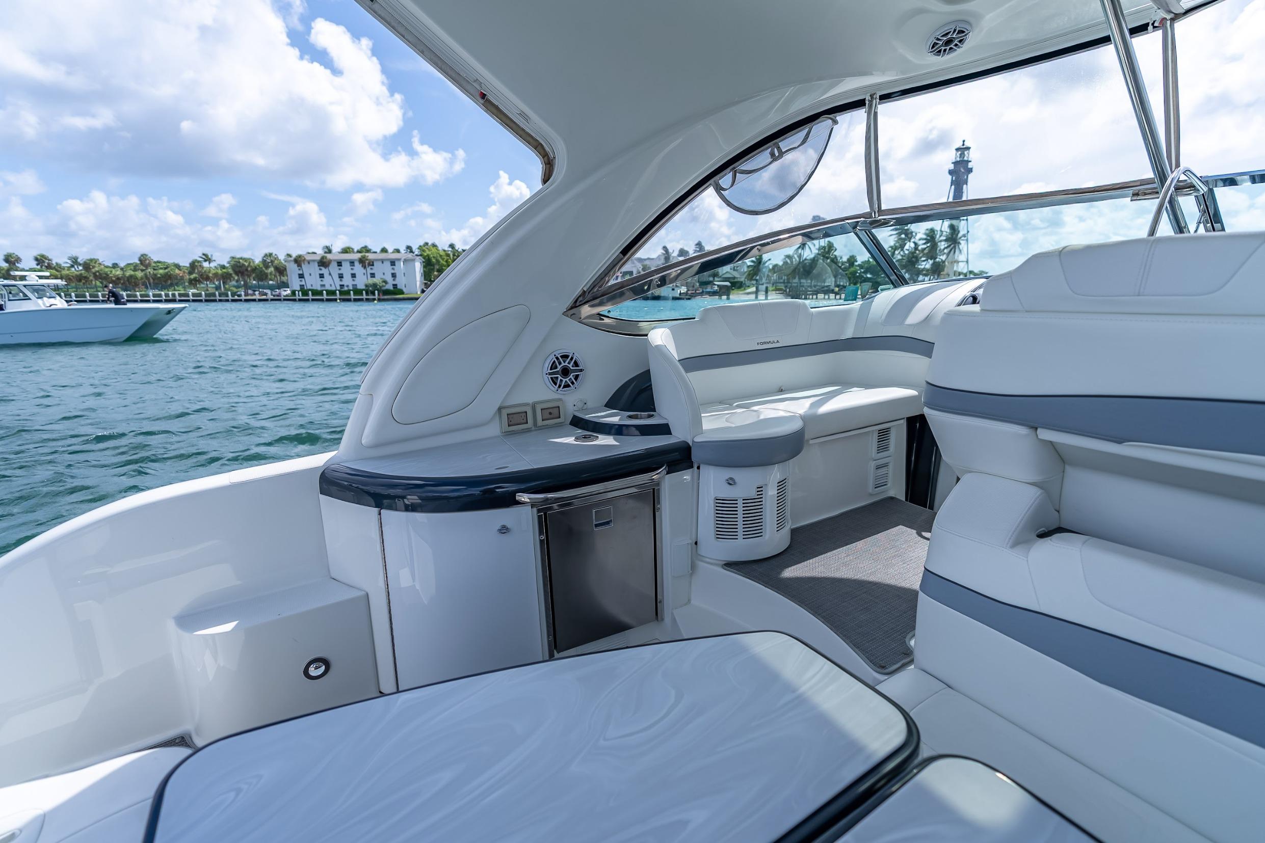 2022 Formula 40 Performance Cruiser interior with luxurious seating and scenic water view.