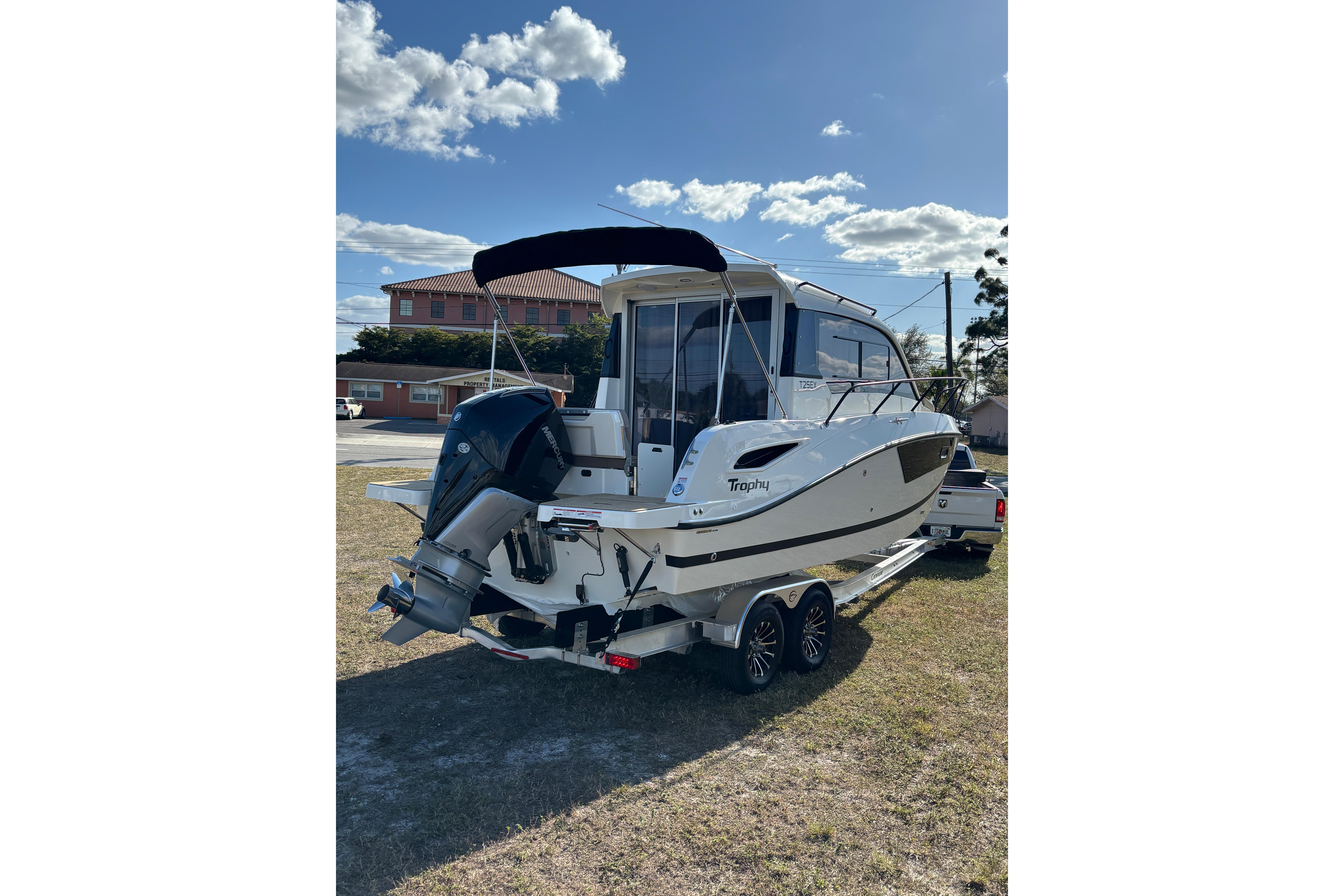 2026 Trophy T 25 Explorer boat on trailer under clear sky.