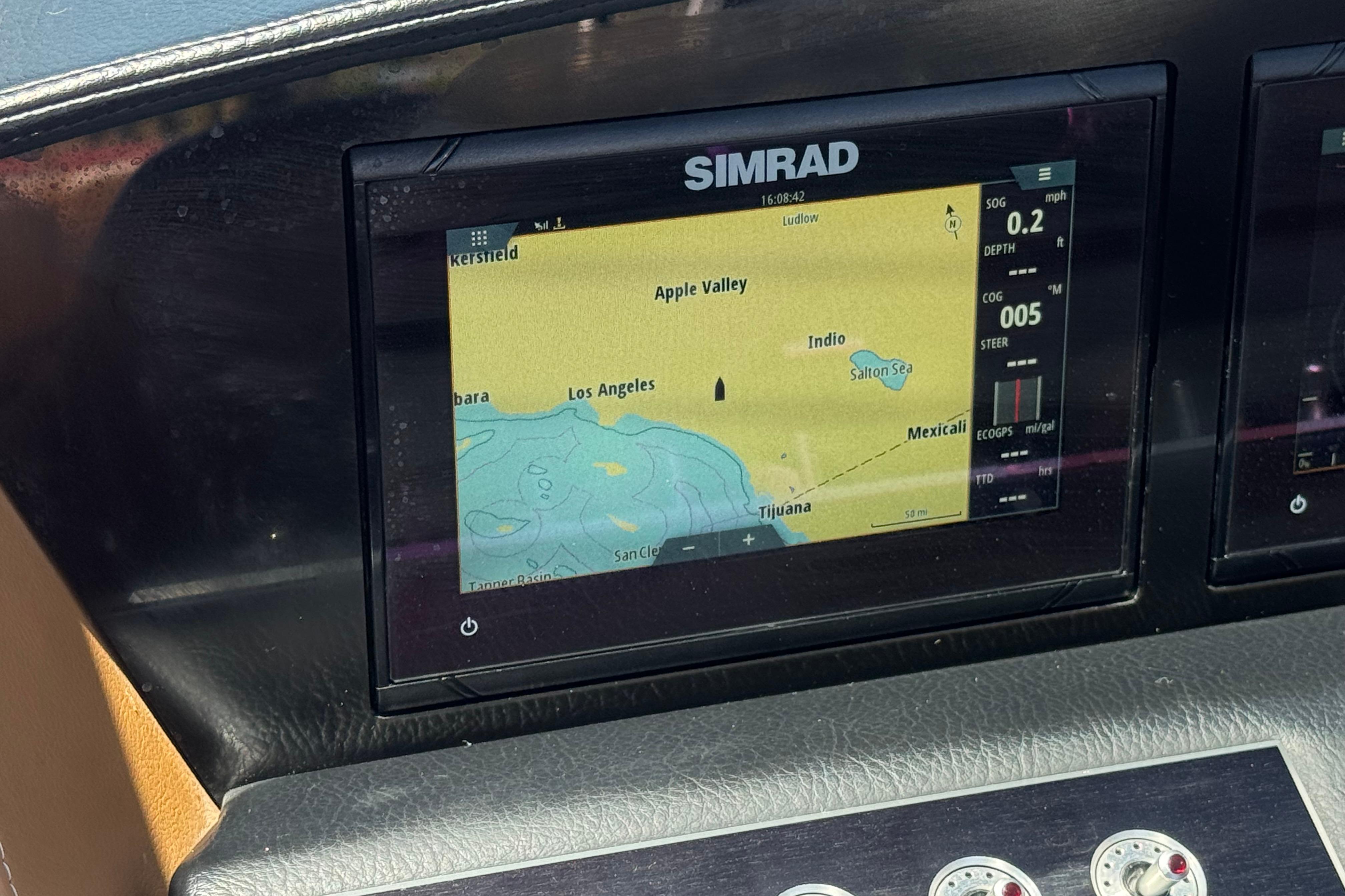 Simrad navigation display on 2022 Four Winns H4 boat, showing map near Los Angeles.