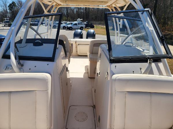 2015 Grady-White Freedom 275 boat interior with open windshield and seating.