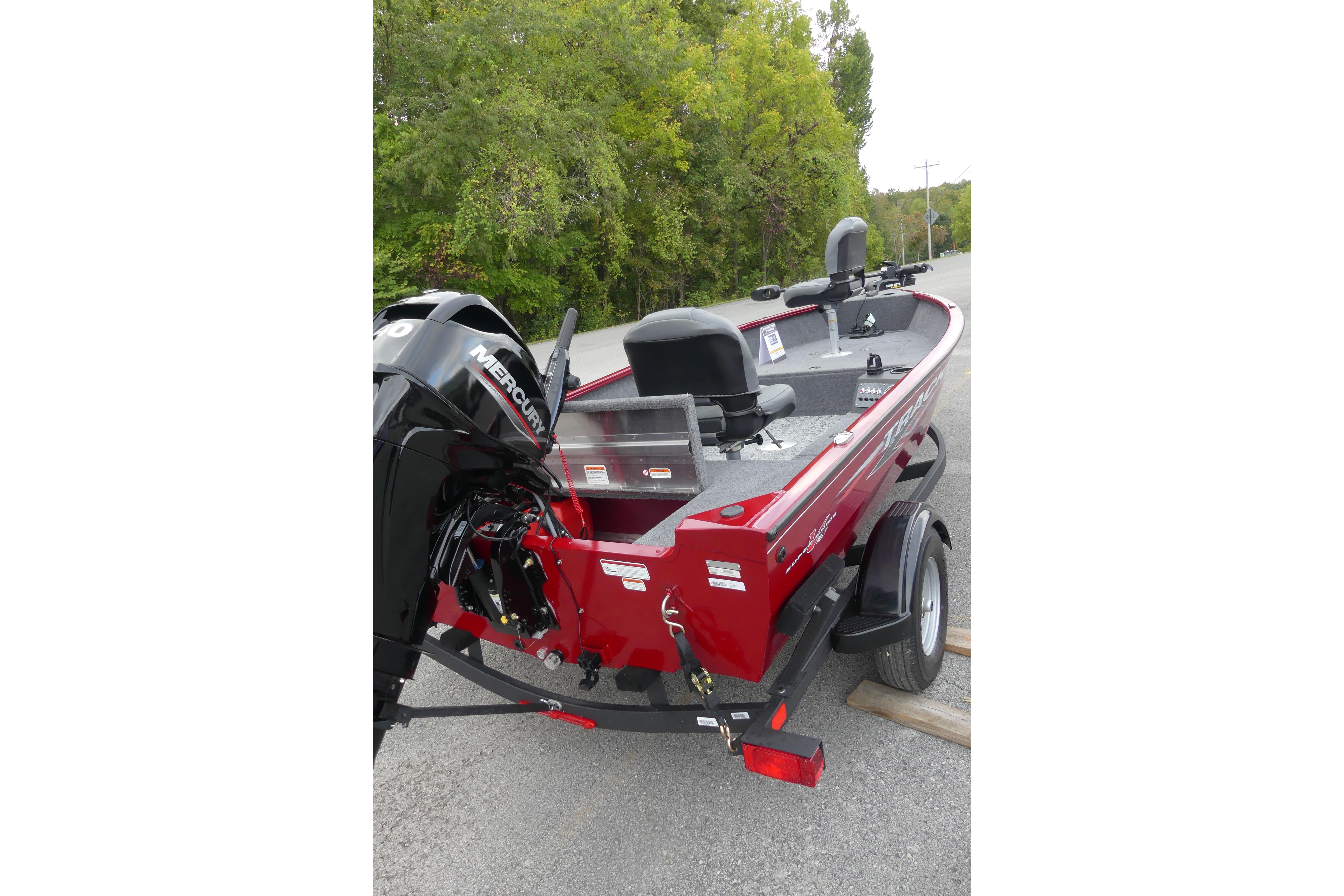2025 Tracker Super Guide V-16 T boat with Mercury engine on trailer.