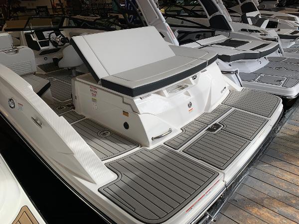 2025 Sea Ray SPX 230 boat with spacious deck and seating area.