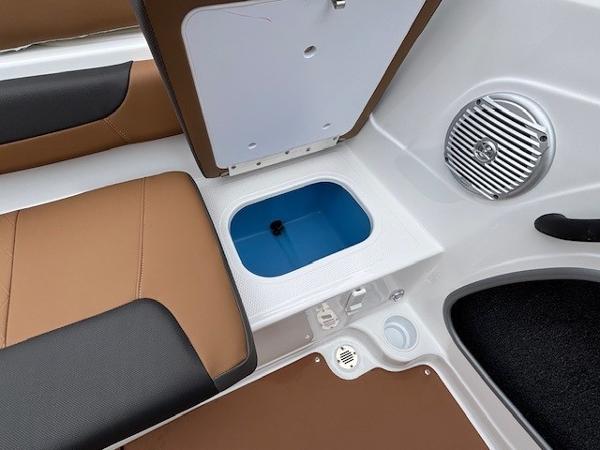 2025 Tahoe 185 S boat interior with storage compartment and speaker.