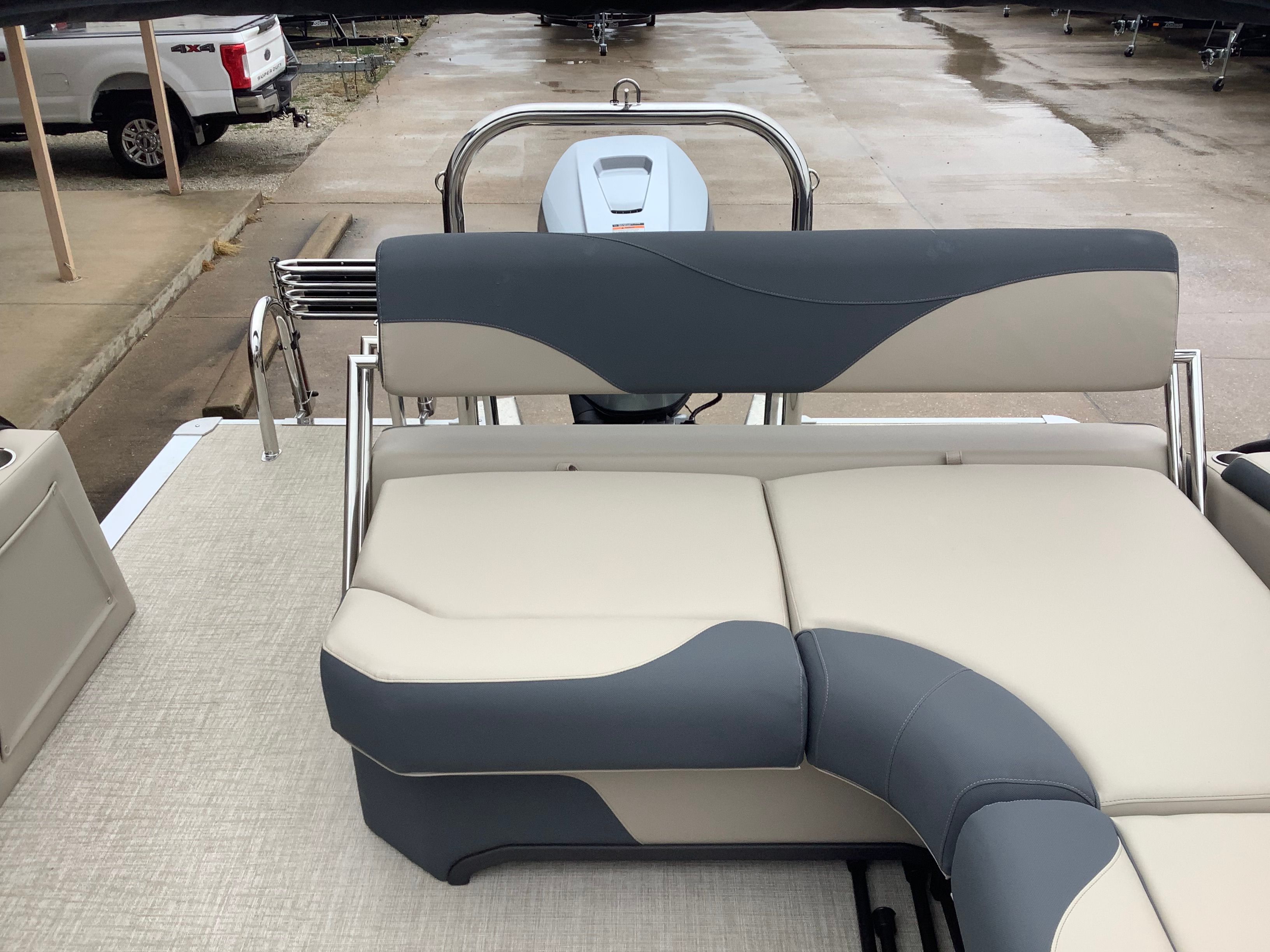 2026 Tahoe 2185 LTZ boat with gray and beige seating.