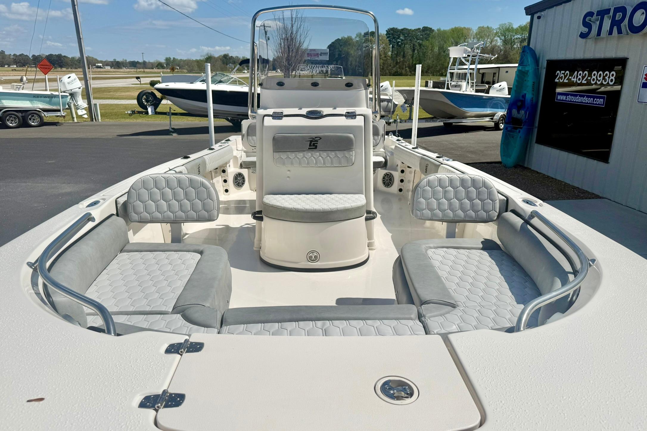 2026 Carolina Skiff 21 Ultra Elite boat interior with gray seating and open deck.