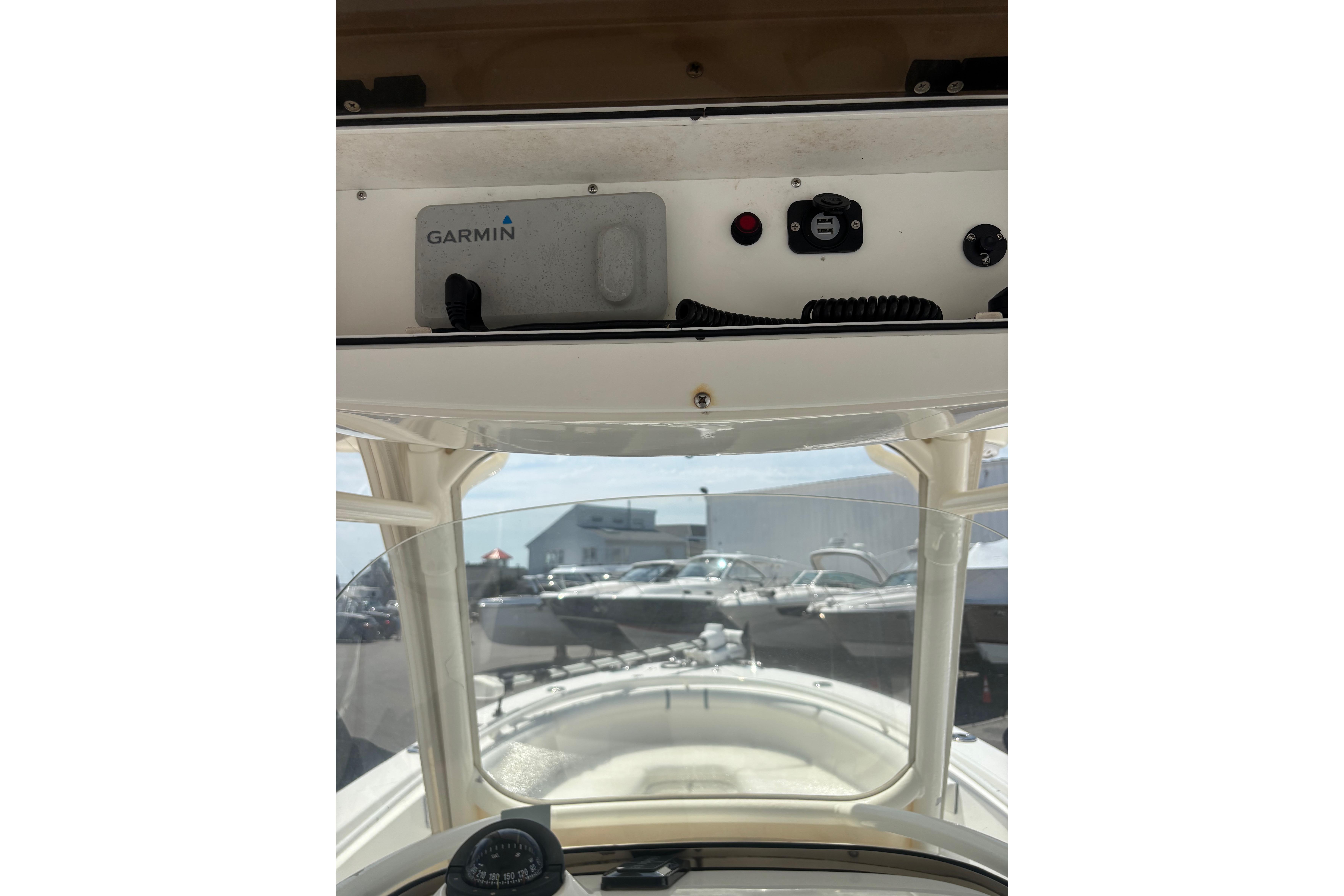 2006 Edgewater 318CC boat dashboard with Garmin navigation system.