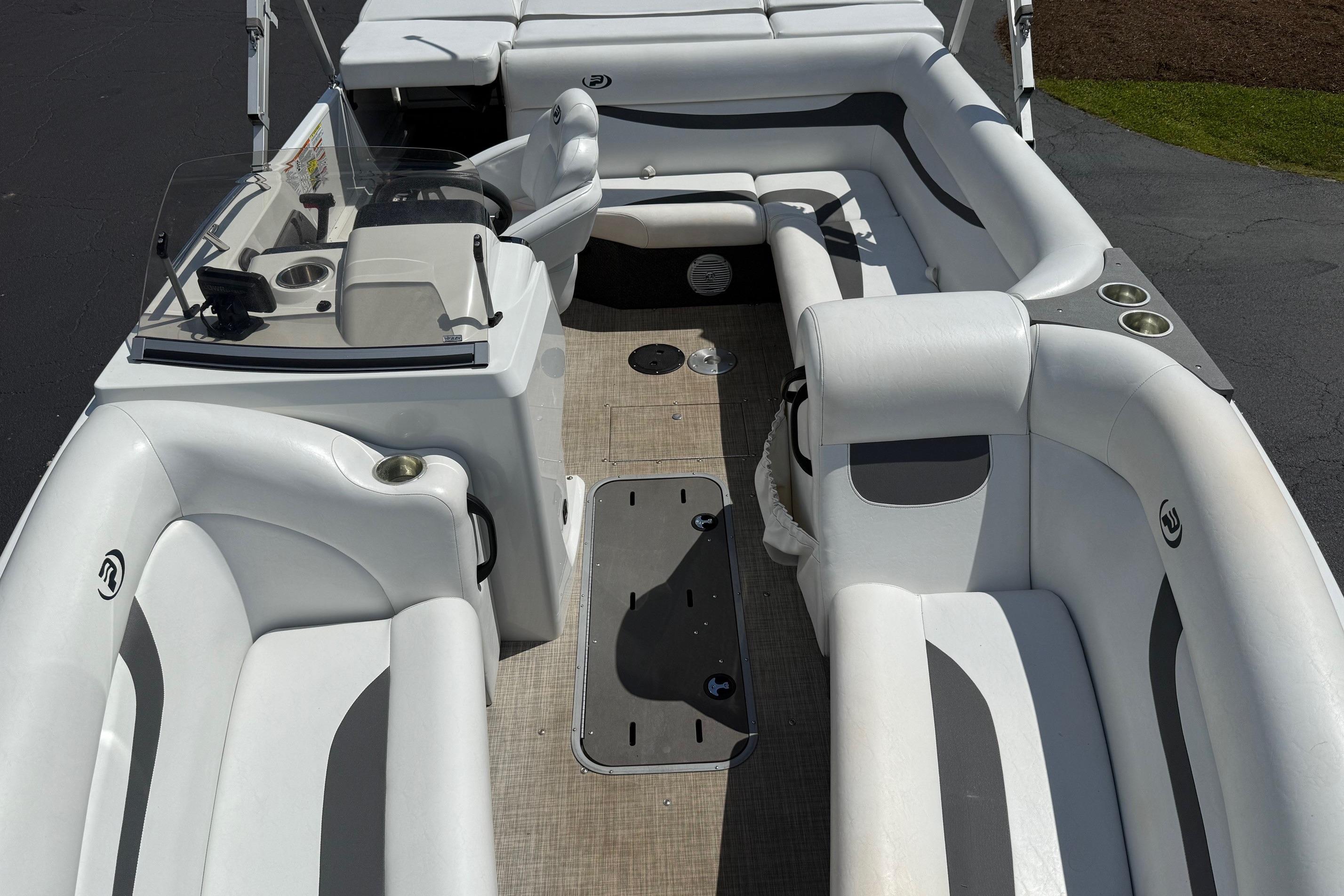 2019 Princecraft Ventura 190 boat interior with white seating and steering console.