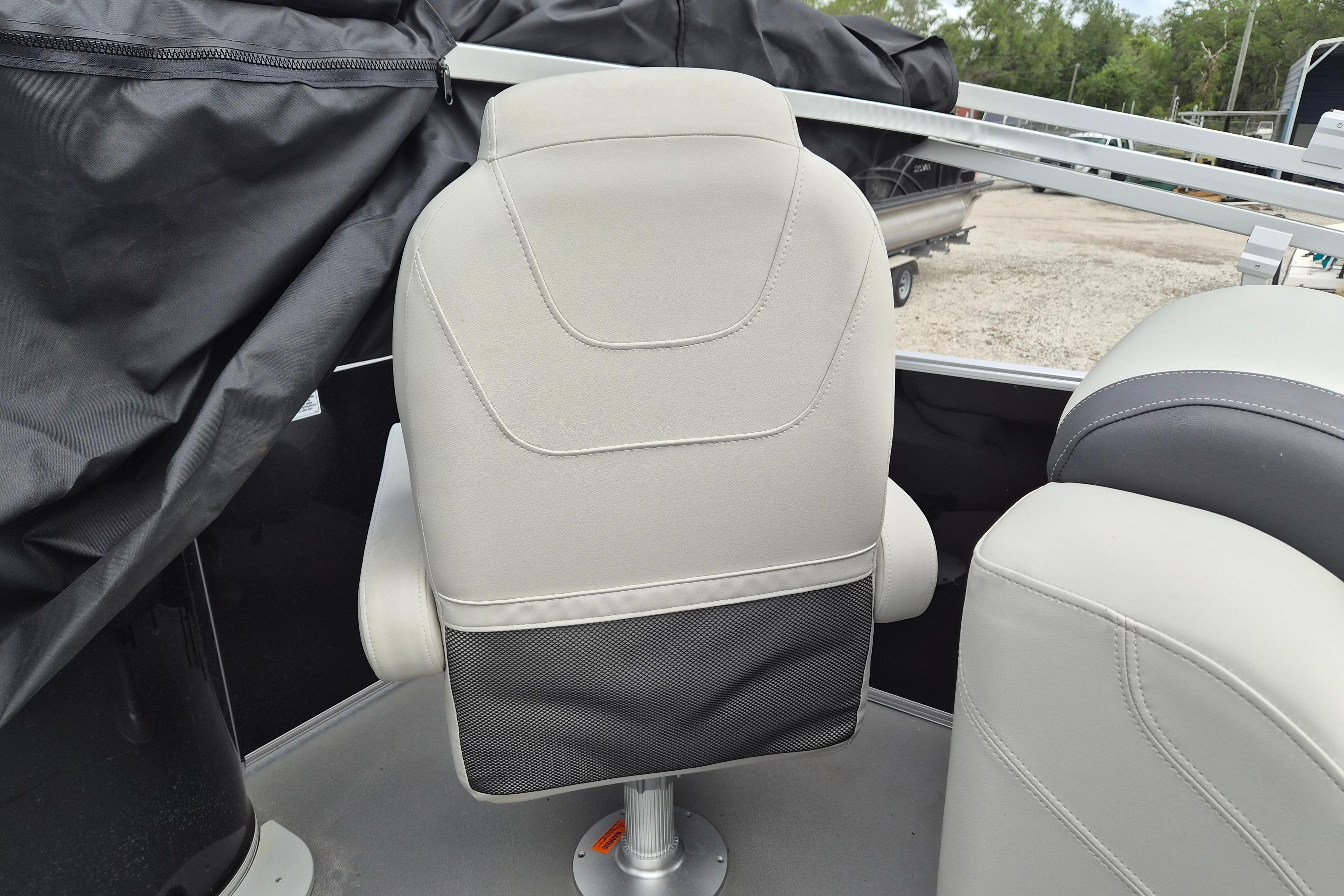 Captain's chair on 2025 Sylvan Mirage Fish 8522 Party Fish boat.