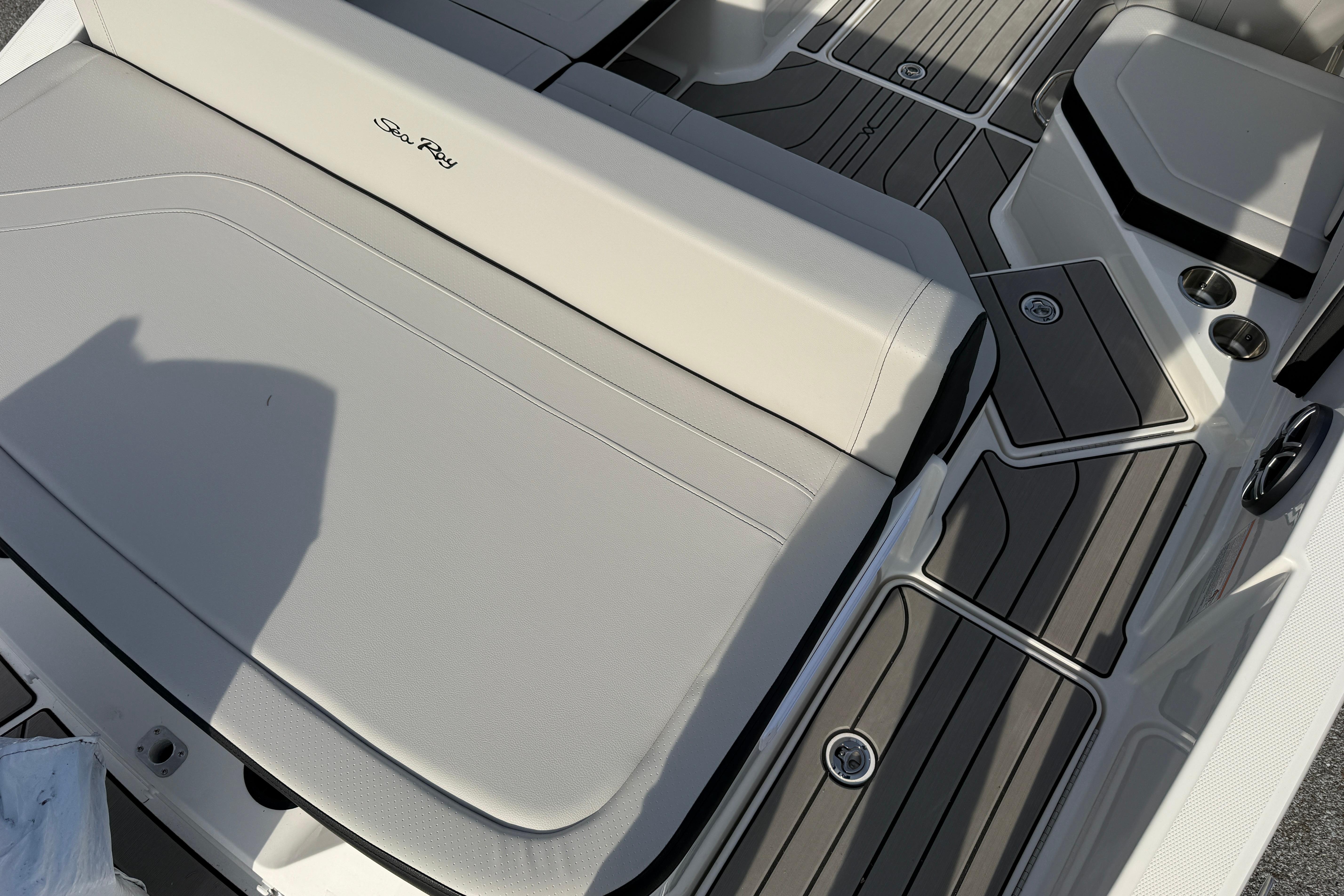 2026 Sea Ray SPX 210 Outboard boat interior with sleek seating and modern design.