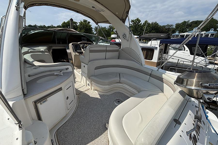 2002 Sea Ray Sundancer 320 yacht interior with spacious seating and modern amenities.