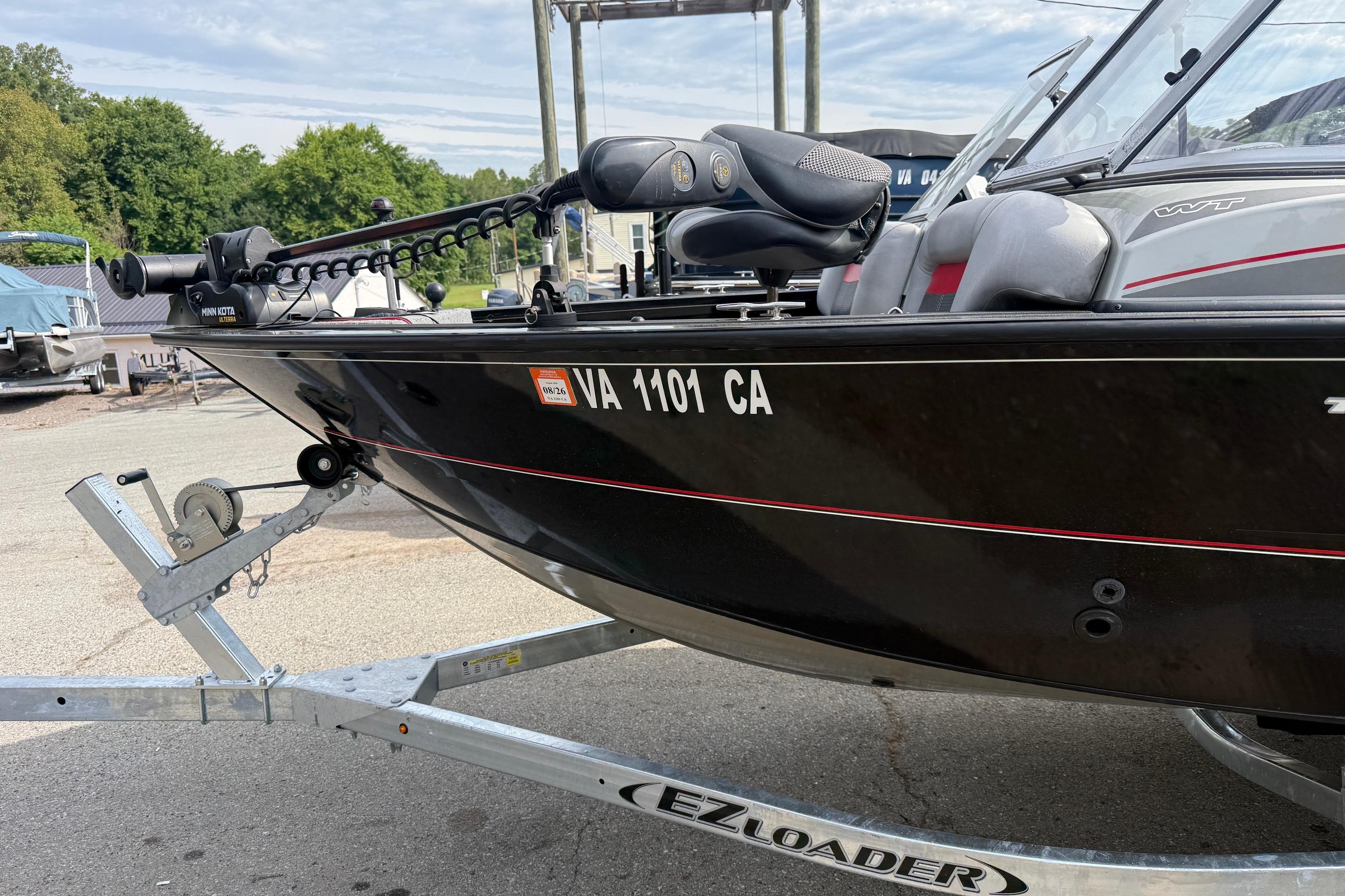 2016 Tracker Targa V-18 WT boat on trailer, featuring Minn Kota trolling motor.