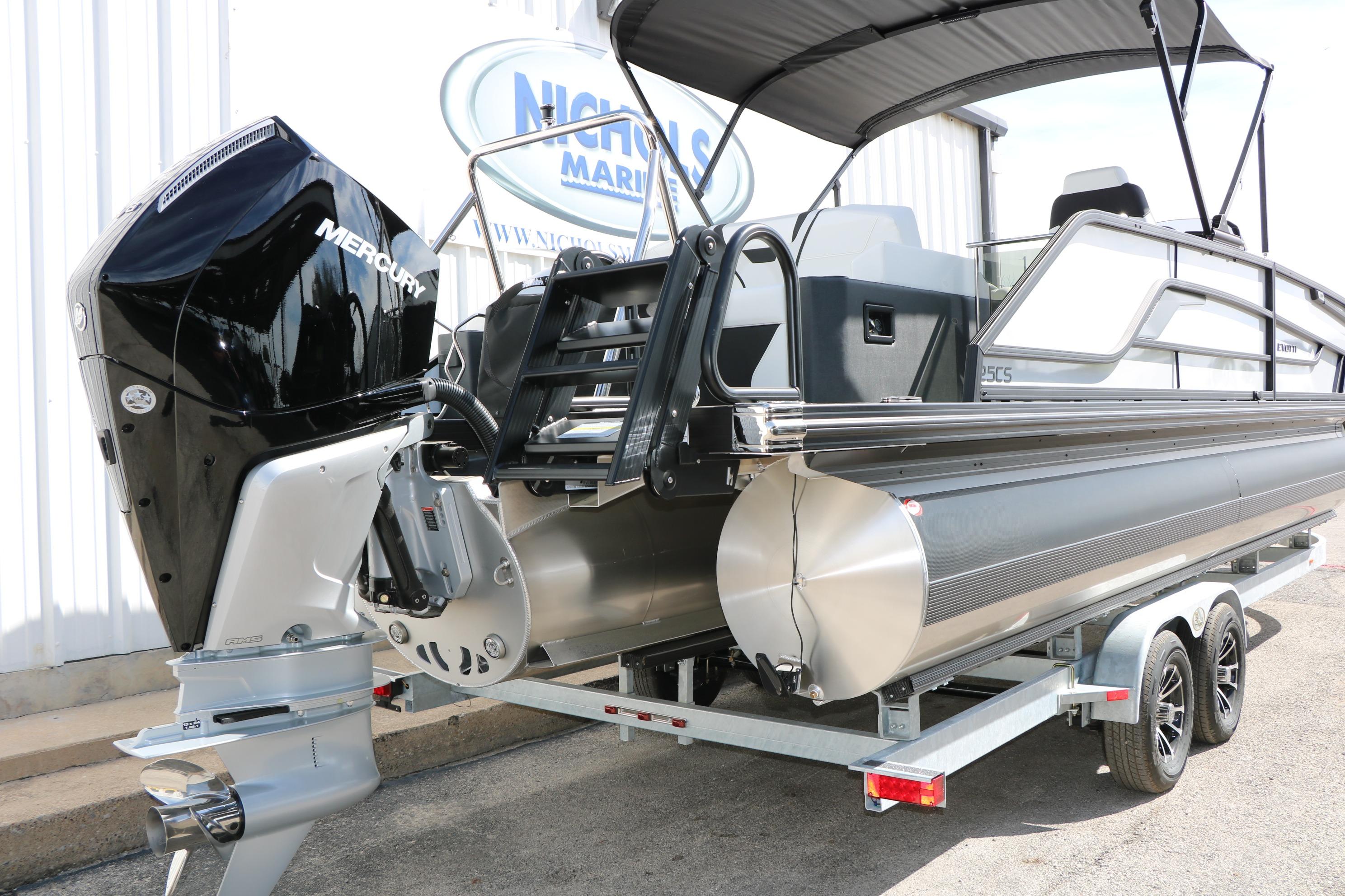 2026 Evotti 725 CS Tri-Toon boat with Mercury engine on trailer.