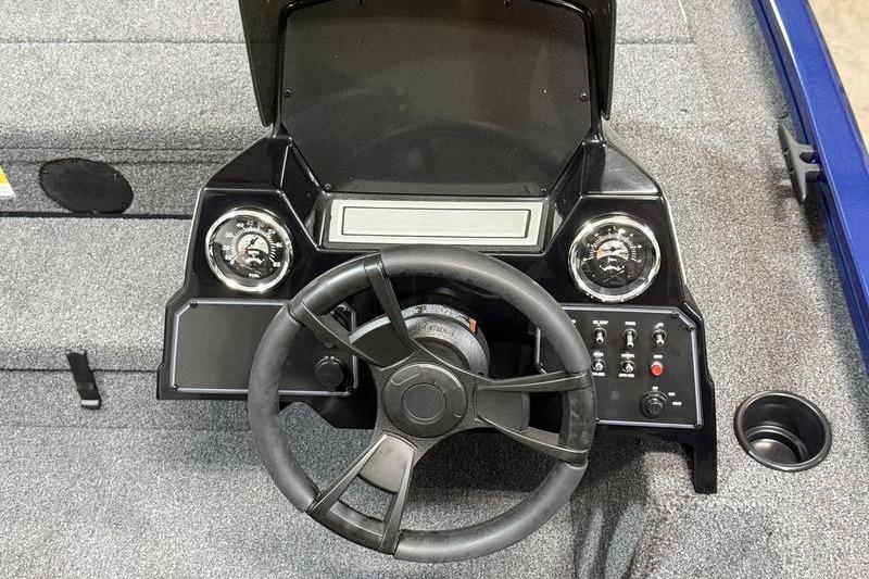 2026 Lowe Stinger 175C boat dashboard with steering wheel and control panel.