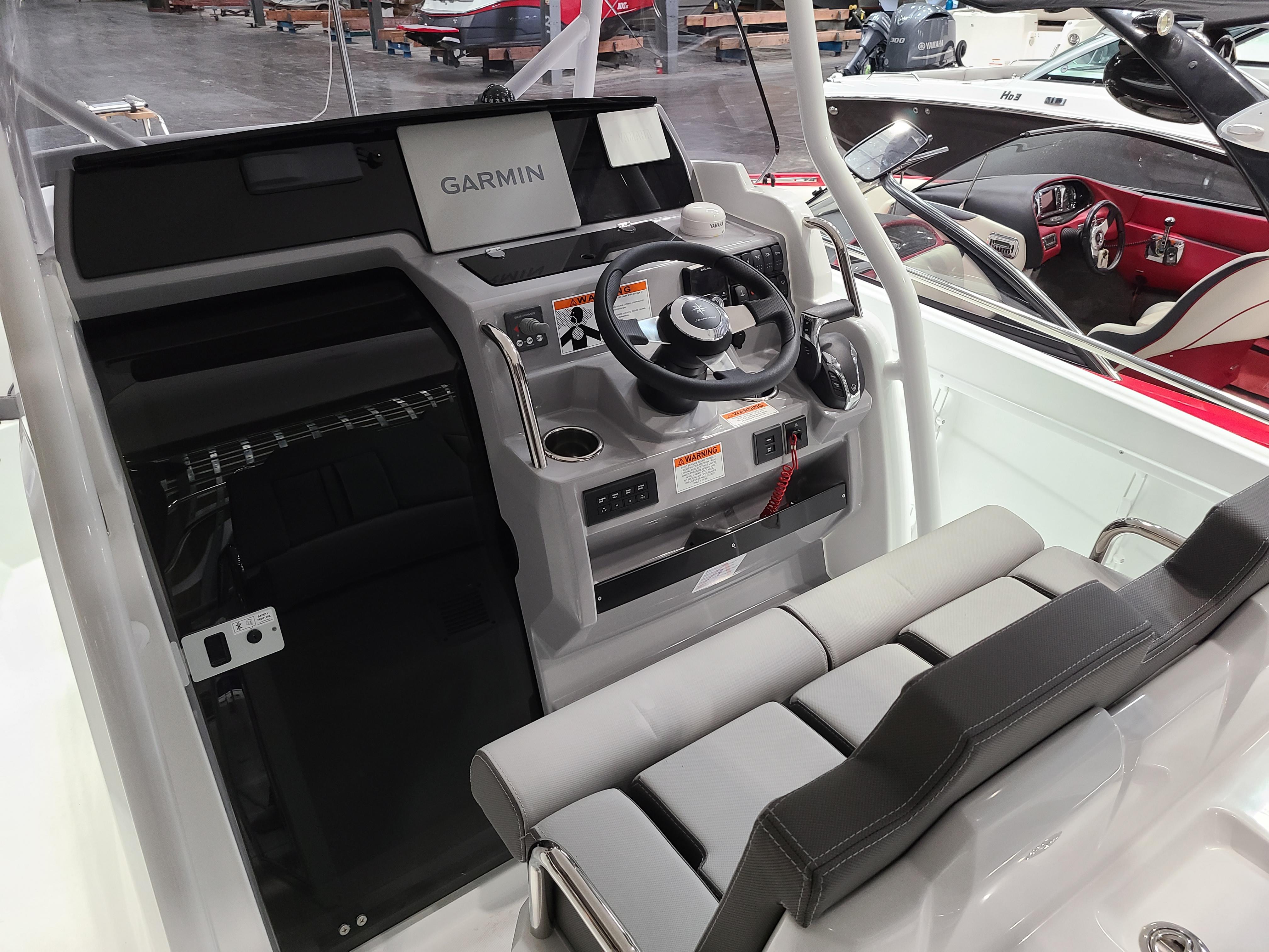 2024 Jeanneau Leader 7.5 WA boat cockpit with Garmin navigation system.