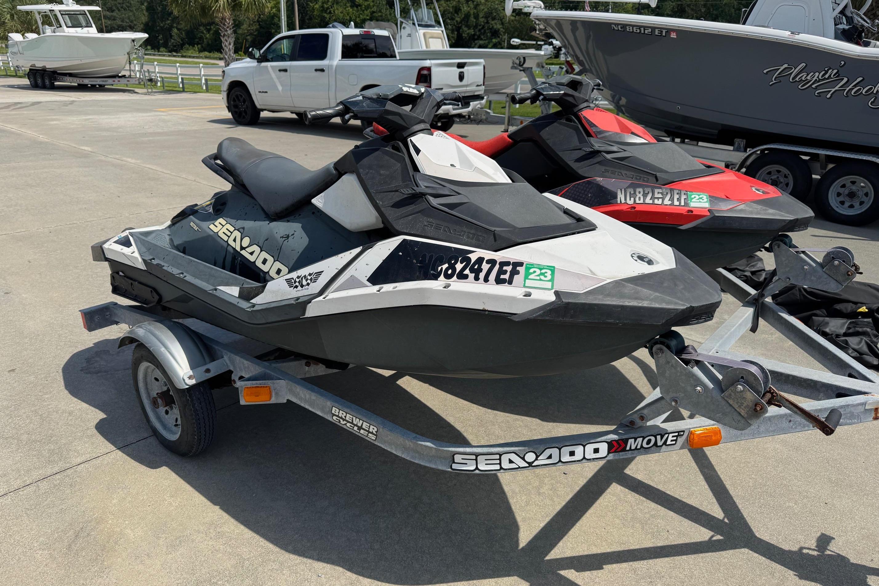 2017 Sea-Doo Spark 2up jet ski on trailer, parked outdoors.