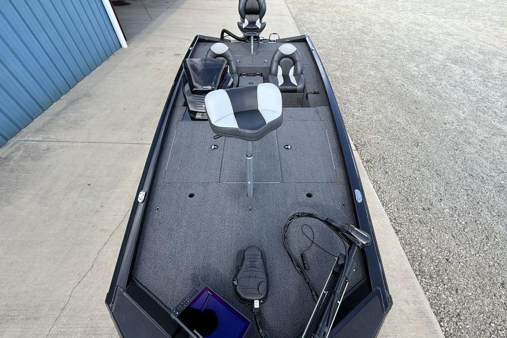 2023 Vexus AVX189 boat interior with seating and fishing equipment on deck.