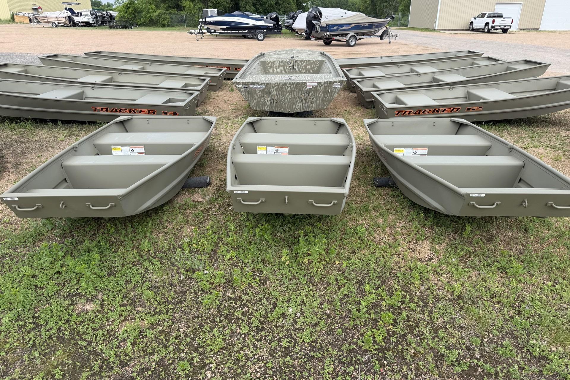 2026 Tracker Grizzly 10 Jon boats displayed outdoors on grass.