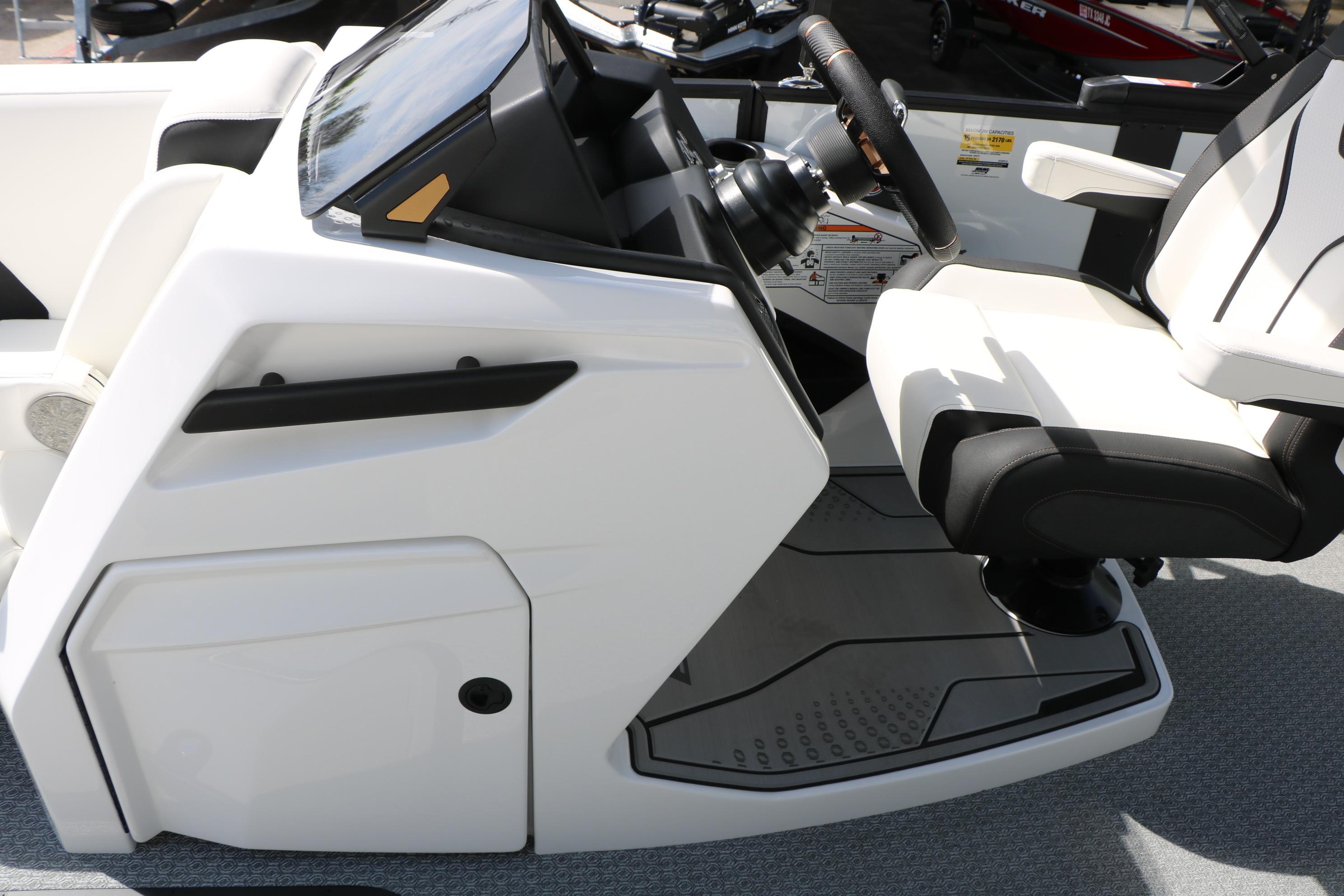 2026 Evotti 725 CS Tri-Toon boat interior with modern steering console and seating.