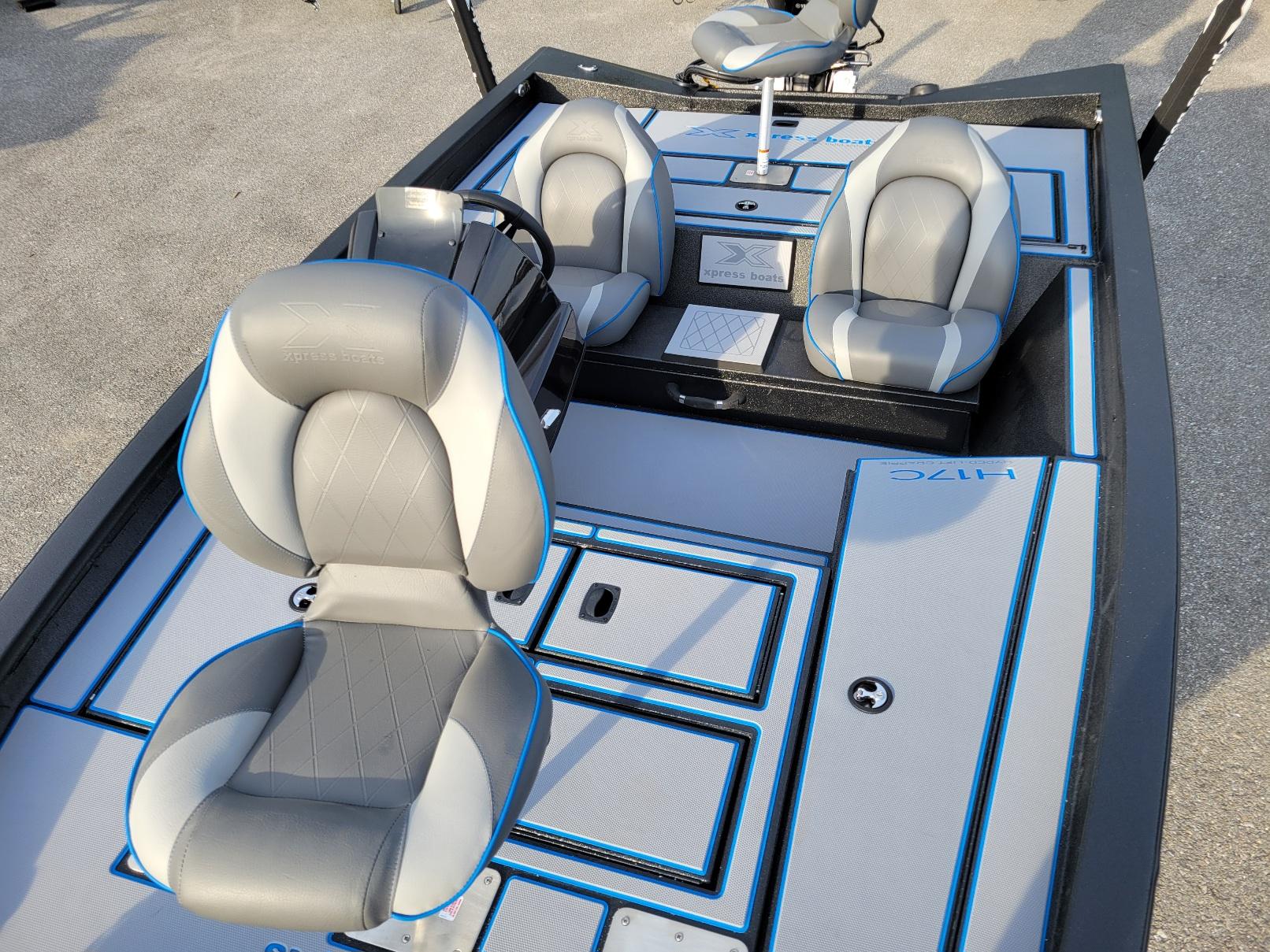2025 Xpress H17C Crappie boat interior with gray and blue seating, in stock.