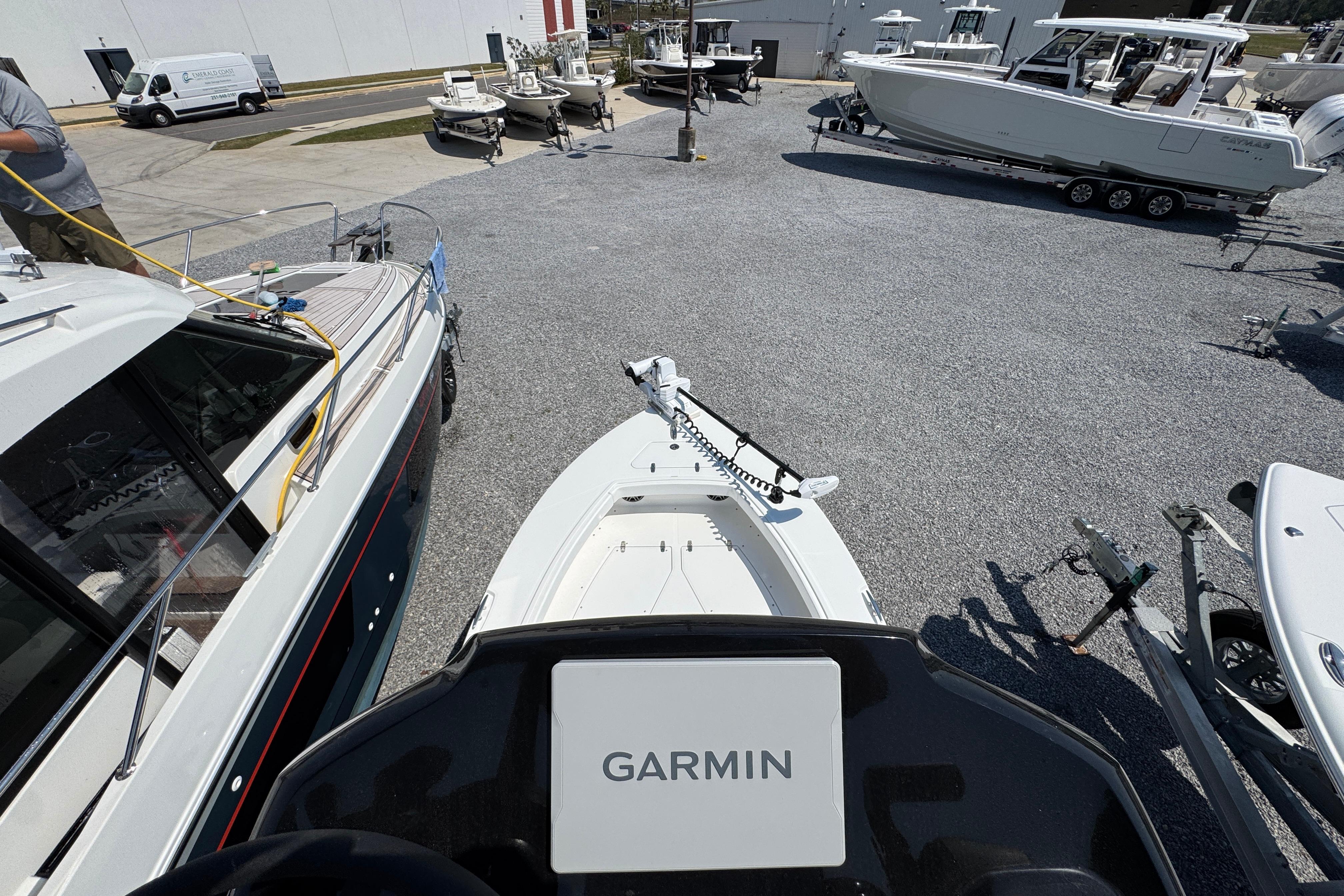 2025 BlackJack 256 Coastal boat with Garmin equipment in a marina setting.