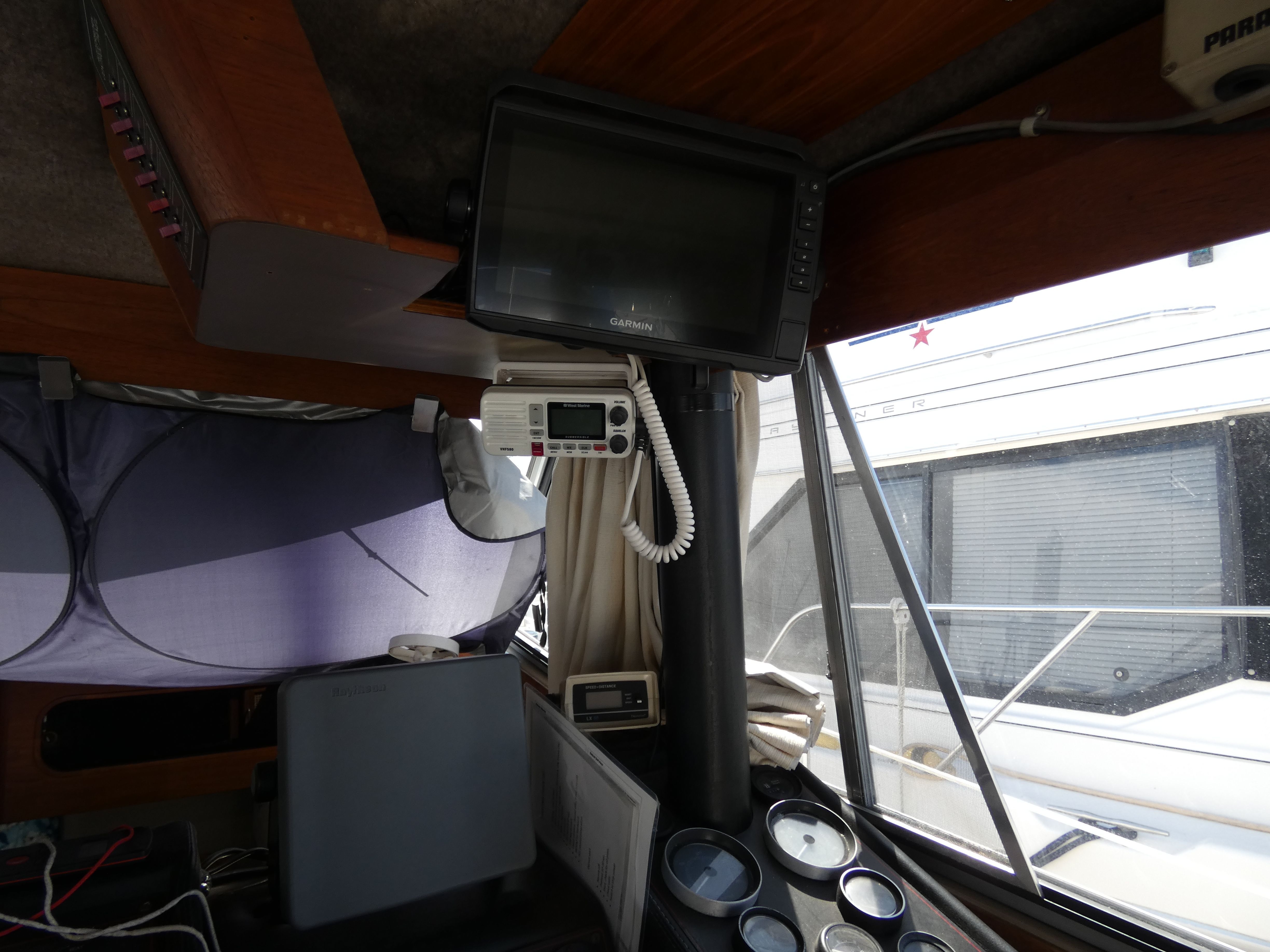 Interior of 1984 Bayliner 3870 Motoryacht with navigation equipment.