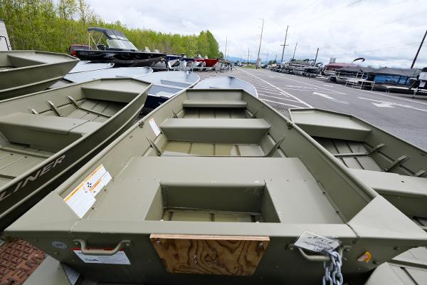 2024 Crestliner 1040 CR Jon boats displayed in a dealership lot.
