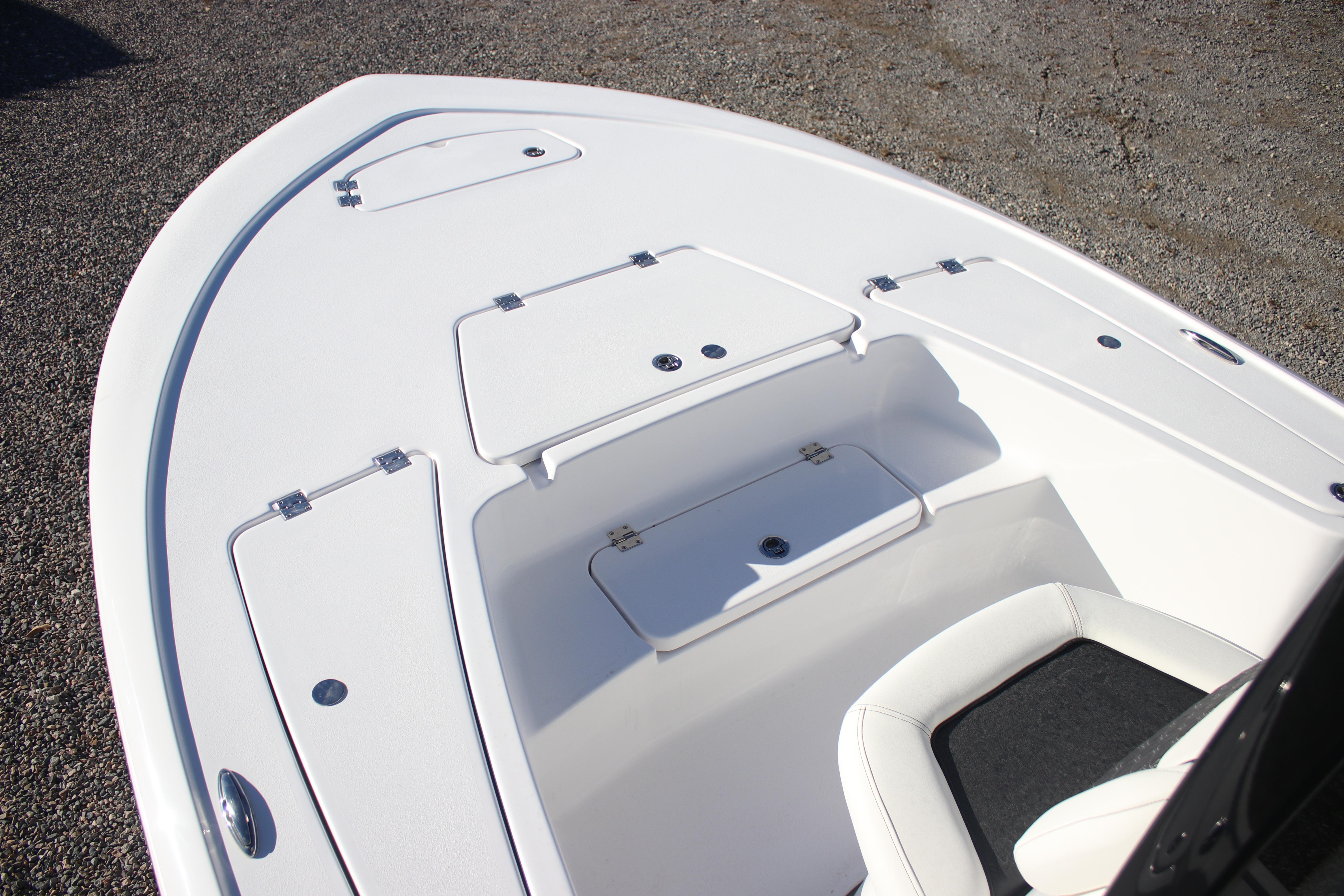 2026 Tidewater 2210 Carolina Bay boat deck with storage compartments.