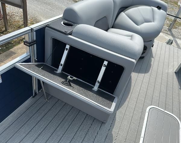2024 Landau ATLANTIS 230C boat with open storage compartment.
