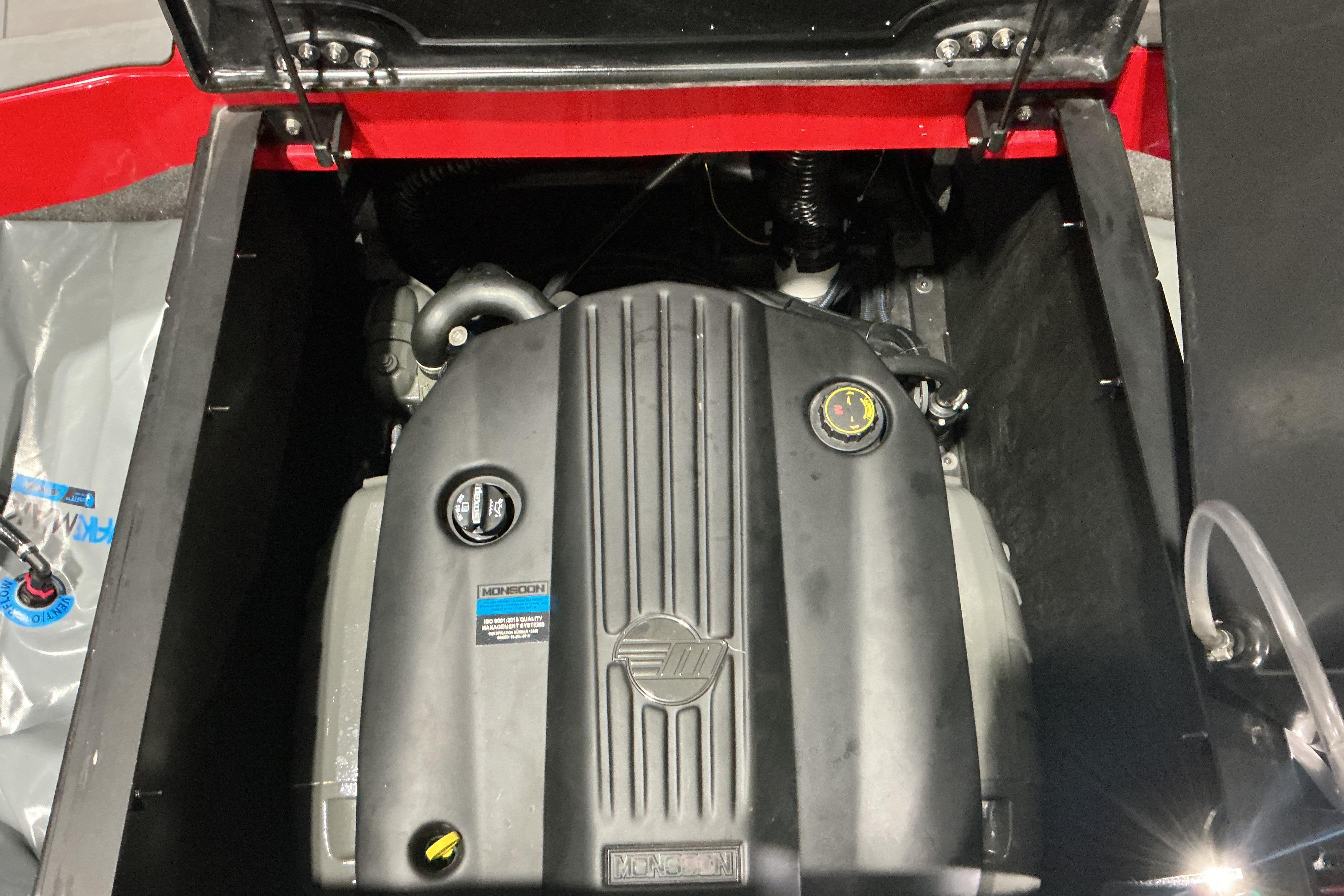 2022 Axis T250 engine compartment showcasing Monsoon engine details.