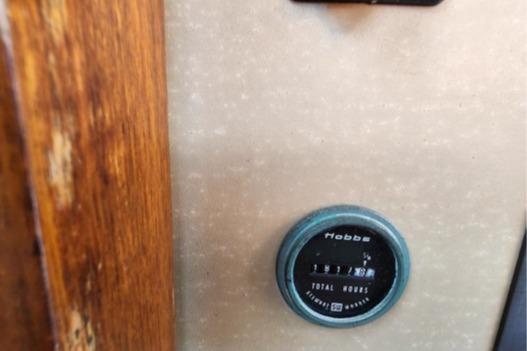 Hour meter on 1985 Wasque Down East Cruiser dashboard.