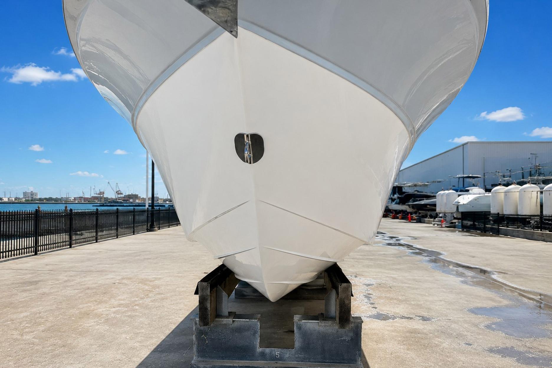 Sea Fox 228 Commander boat on dry dock, showcasing hull design, 2002 model.