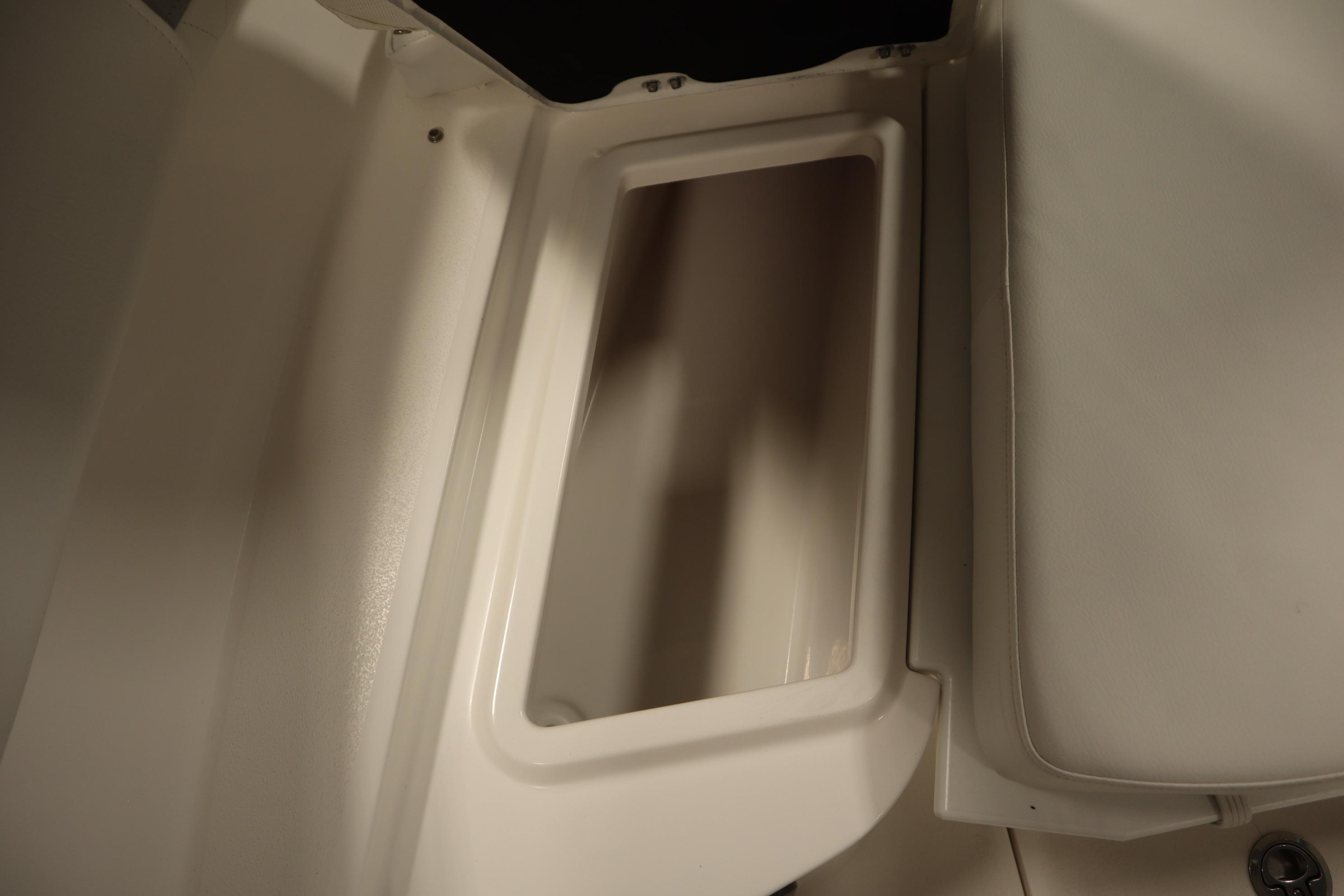 Storage compartment in 2026 Sea Fox 228 Commander boat interior.