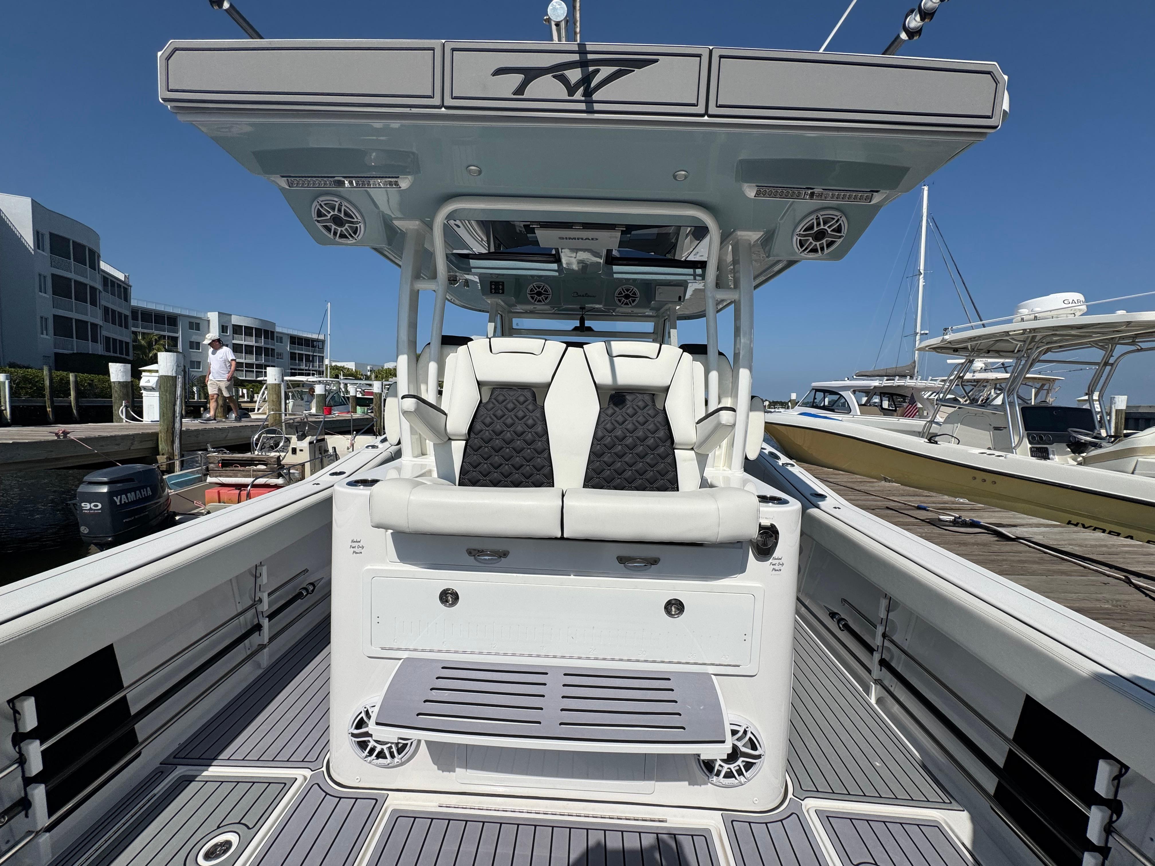 2024 Tidewater 380 CC Adventure boat interior with seating and modern design.