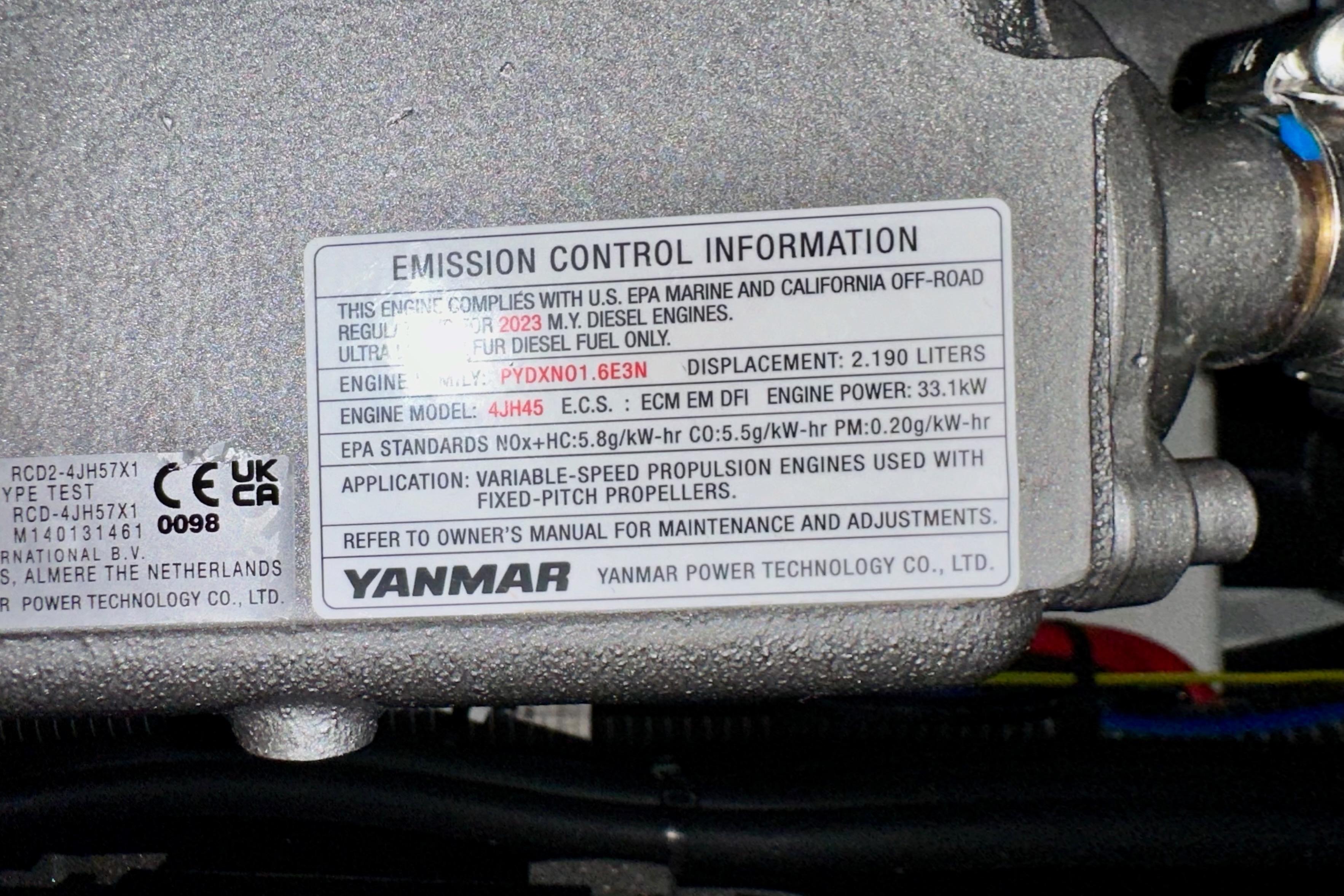 Emission control label on Yanmar engine for Jeanneau Sun Odyssey 410, 2024 model.