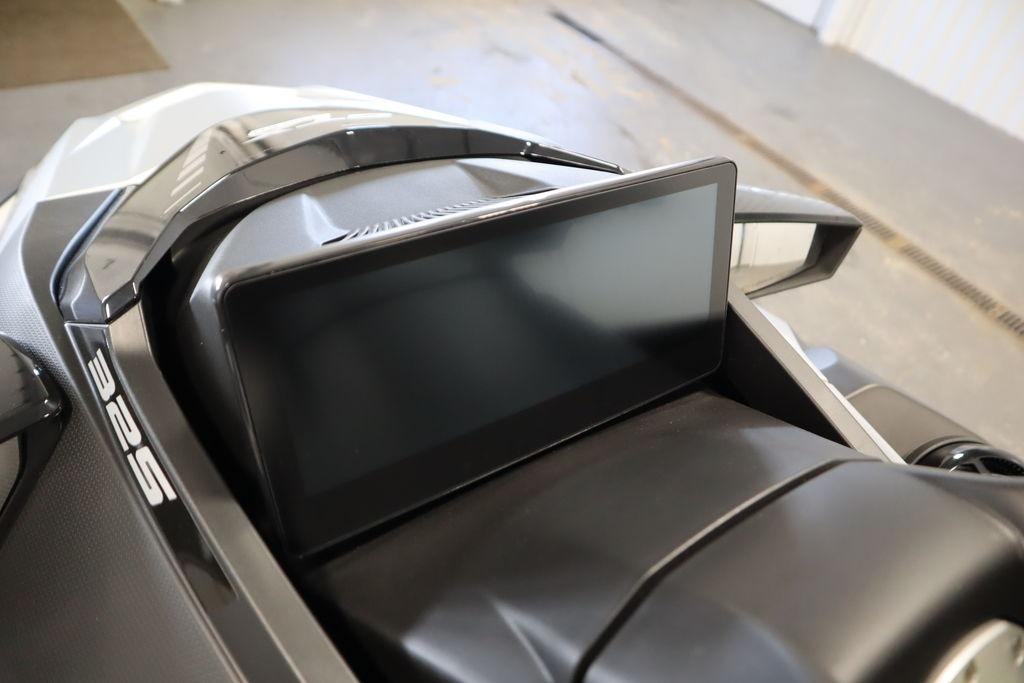 2026 Sea-Doo GTX Limited 325 dashboard with digital display and sleek design.