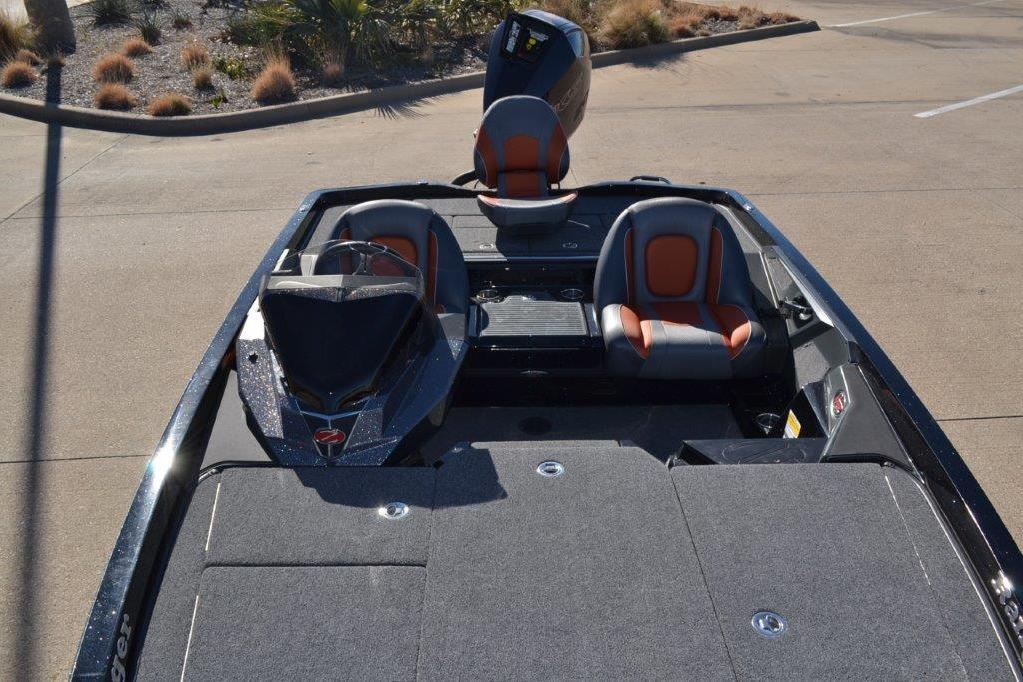 2025 Ranger Z518 Cup-Equipped boat interior with dual seats and steering console.