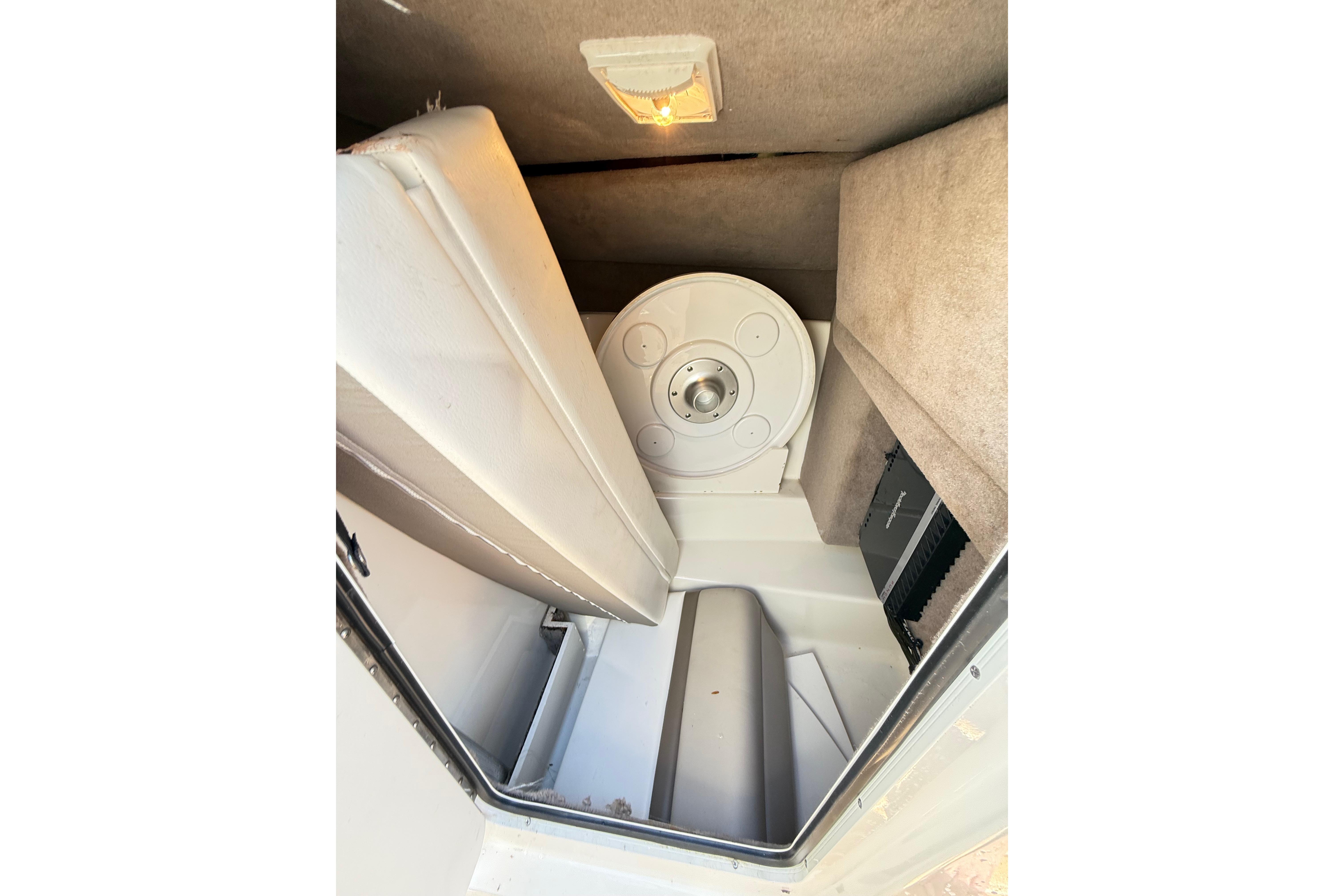 Interior storage compartment of a 2011 Sea Ray 270 SLX boat.
